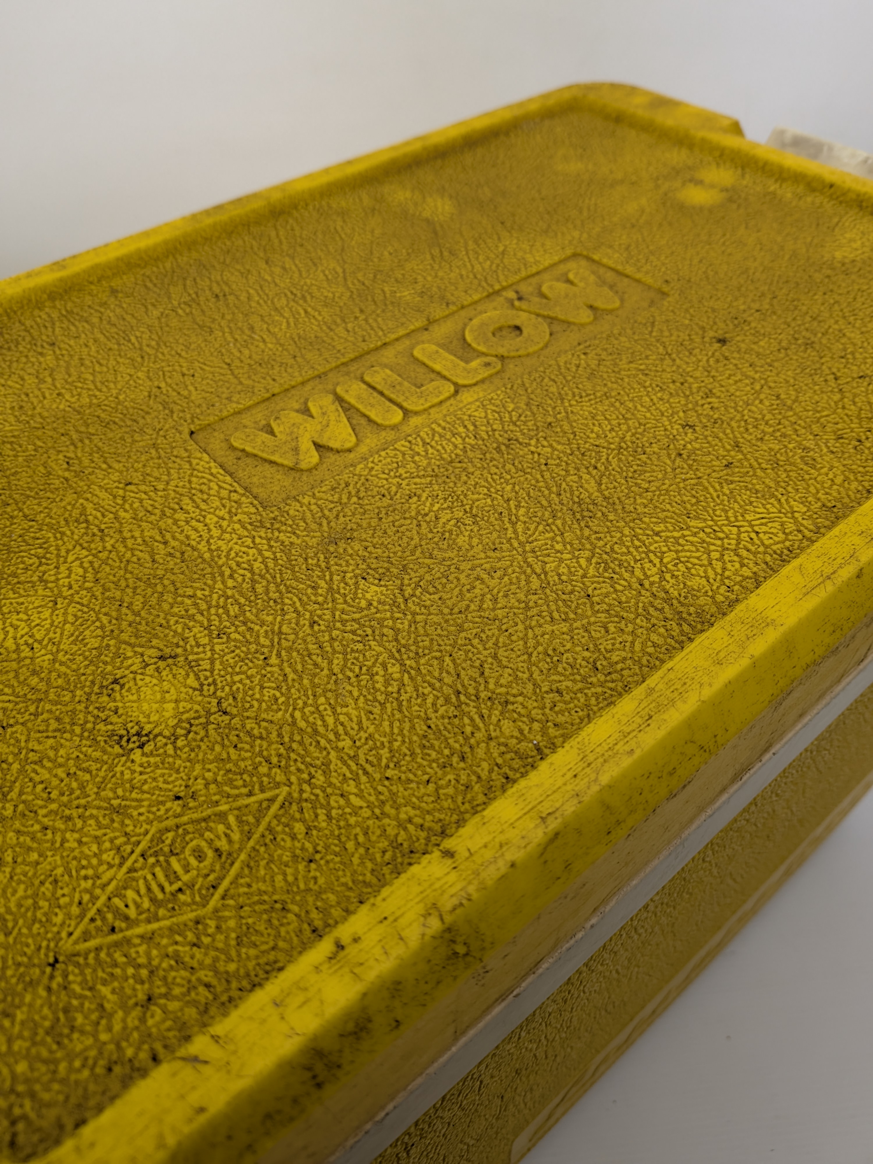 A vintage Willow yellow insulated cooler, likely from the mid-20th century, featuring a textured exterior and white plastic handle. - View 3