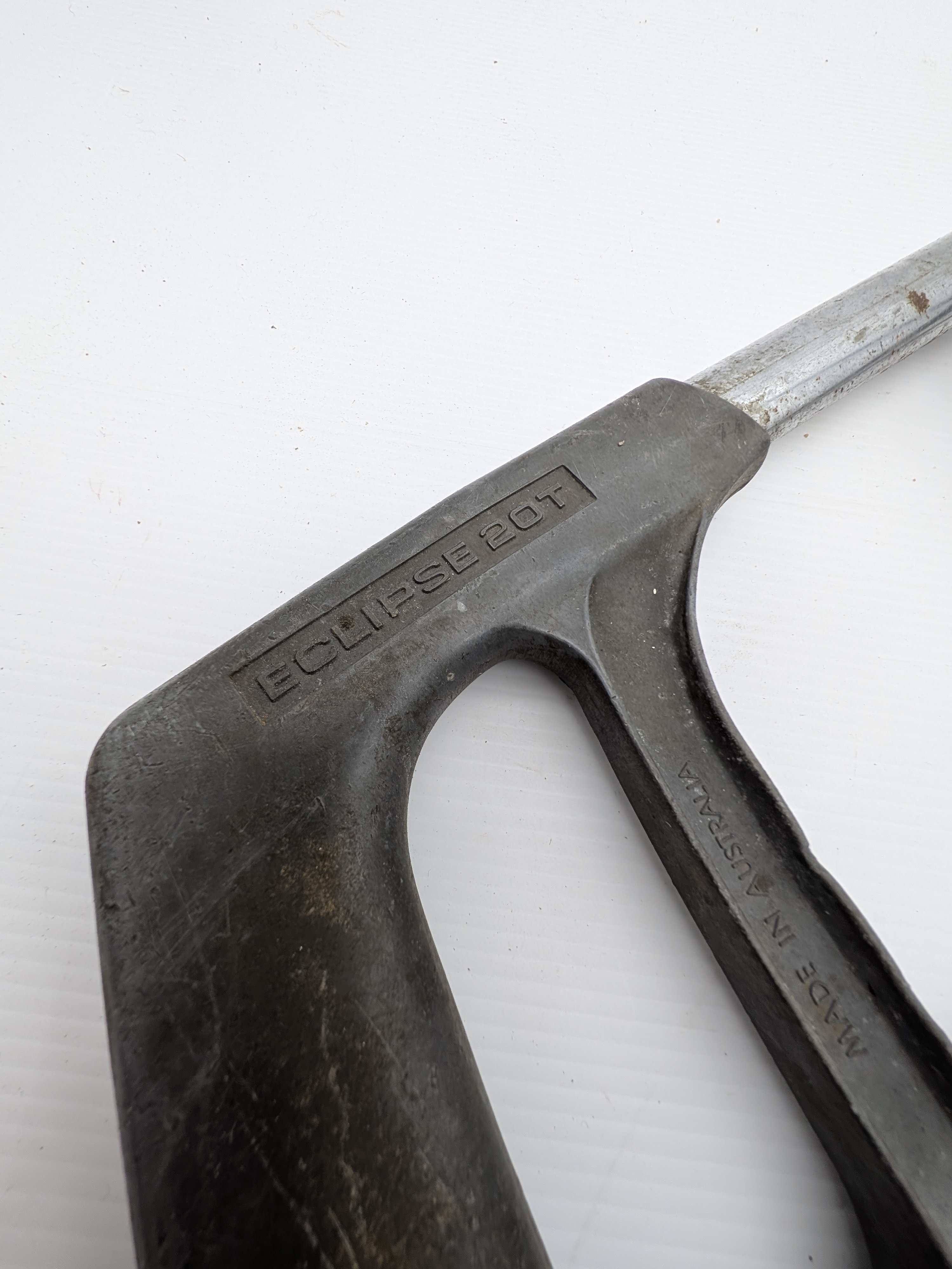 A collection of vintage Australian hand tools, including an Eclipse hacksaw, a bow saw, and a Wiltshire file, all showing significant signs of age and use. - View 5