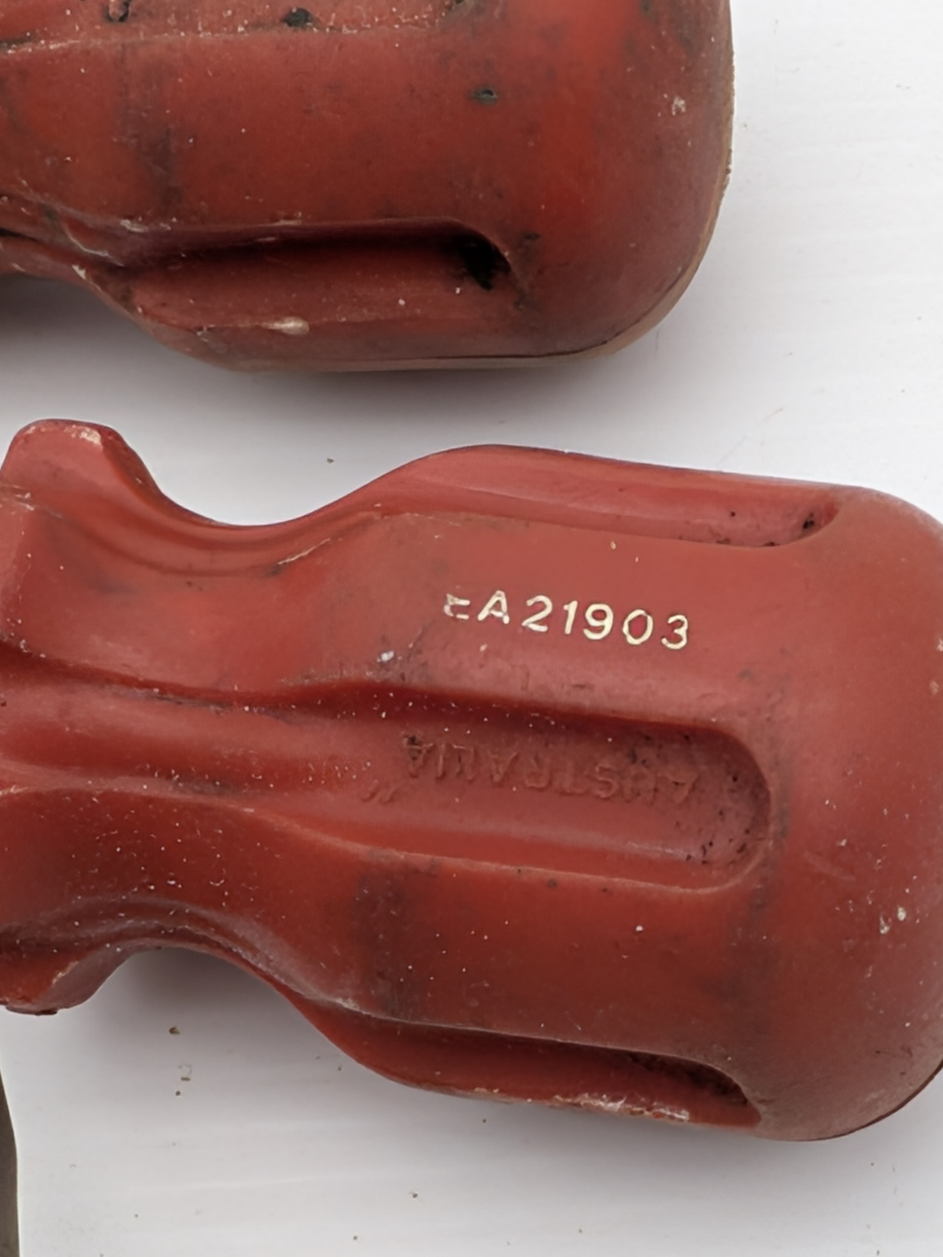 A collection of vintage hand tools including various sizes of Stanley screwdrivers with colored plastic handles and Sidchrome wrenches, showing signs of heavy use and age. - View 7