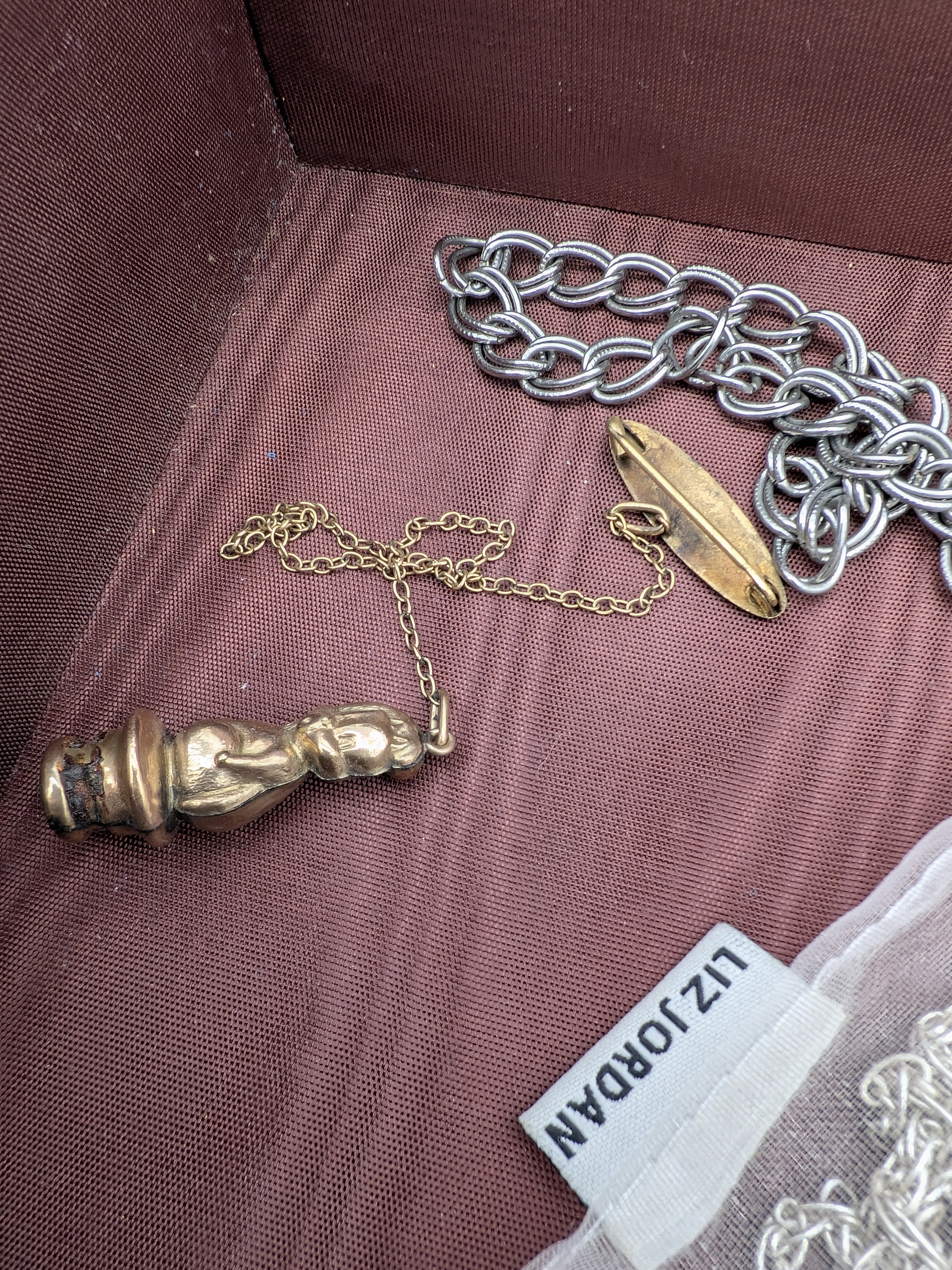 An assortment of costume jewellery and watches, spanning various styles and eras, presented across two plastic storage containers, a decorative red velvet-covered box, and includes a 'Monet' branded pouch. - View 6