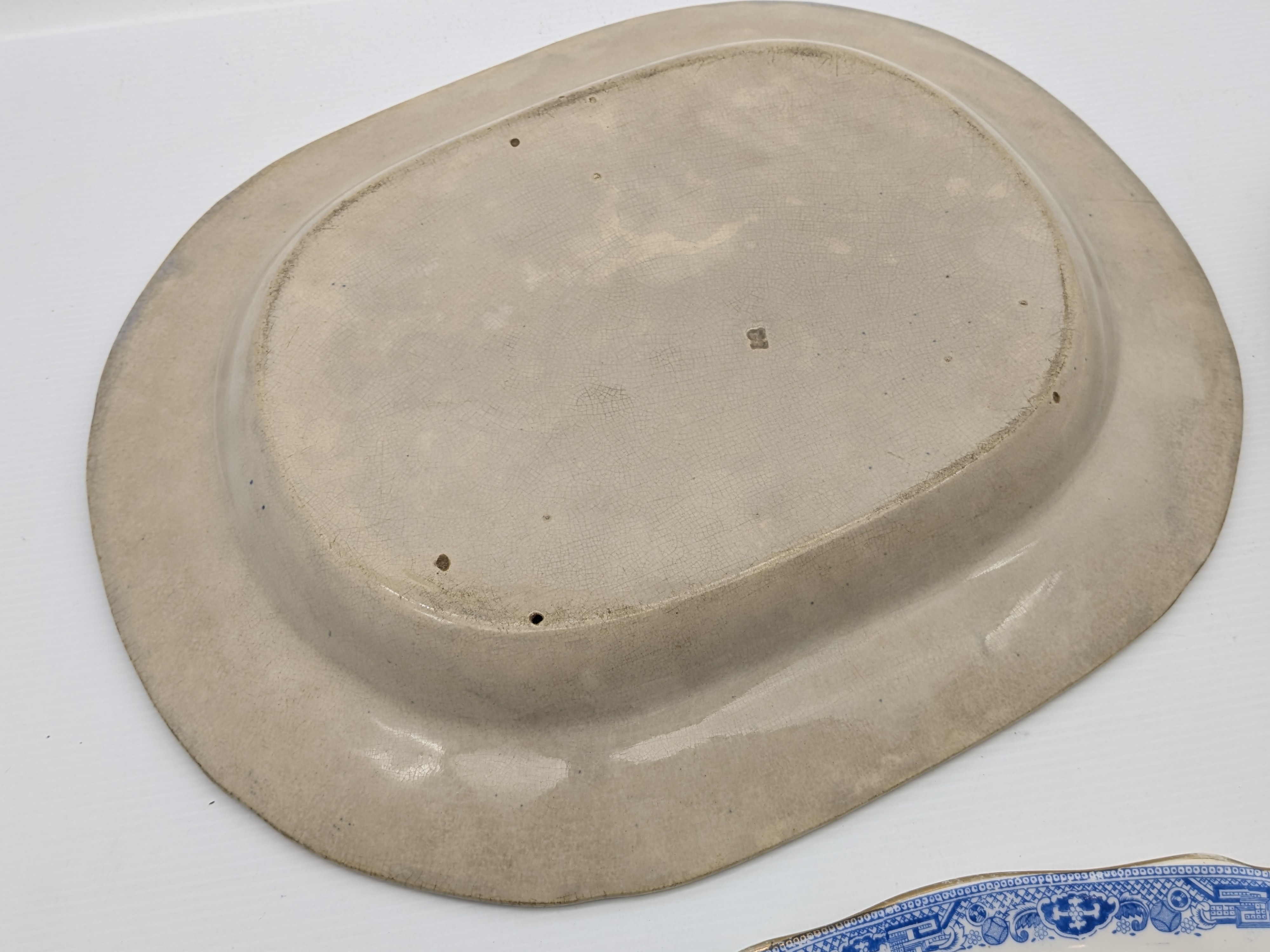Lot of Three English Willow Pattern Ceramic Platters and Plate — Lot 052, photograph 7