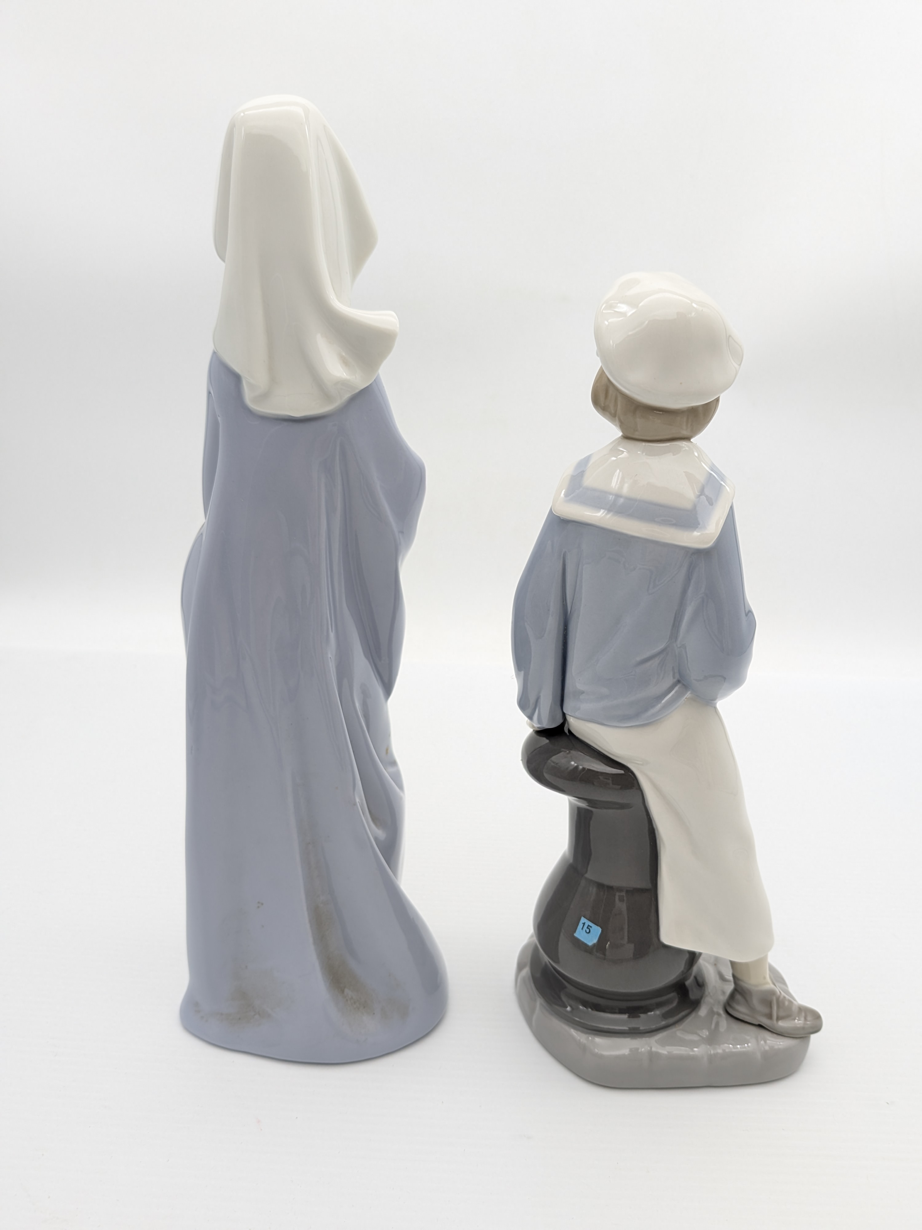 Two Lladro Porcelain Figurines: Praying Girl and Sailor with Boat — Lot 059, photograph 3