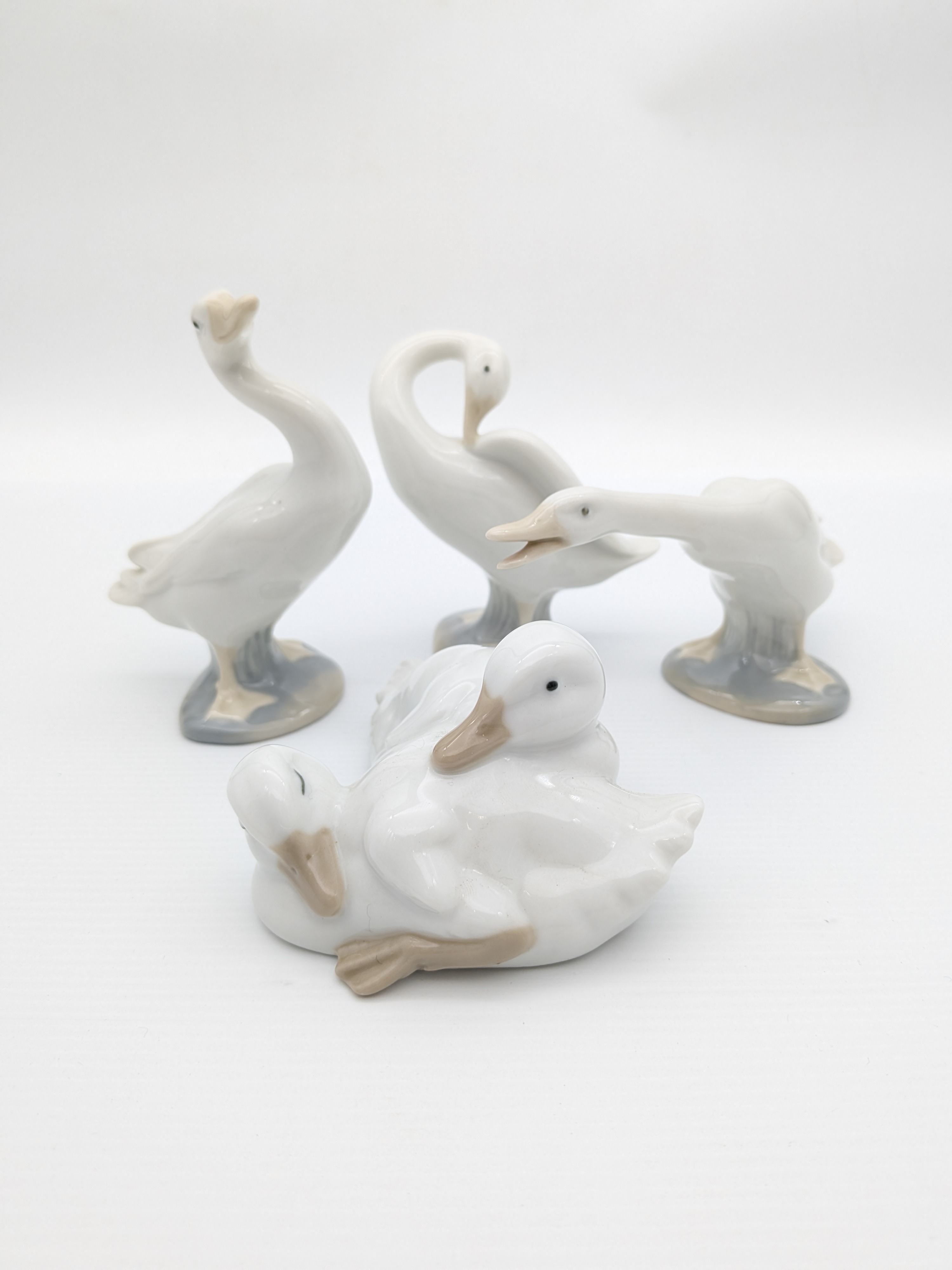 Set of Four Nao by Lladró Porcelain Geese Figurines, 1990's — Lot 066