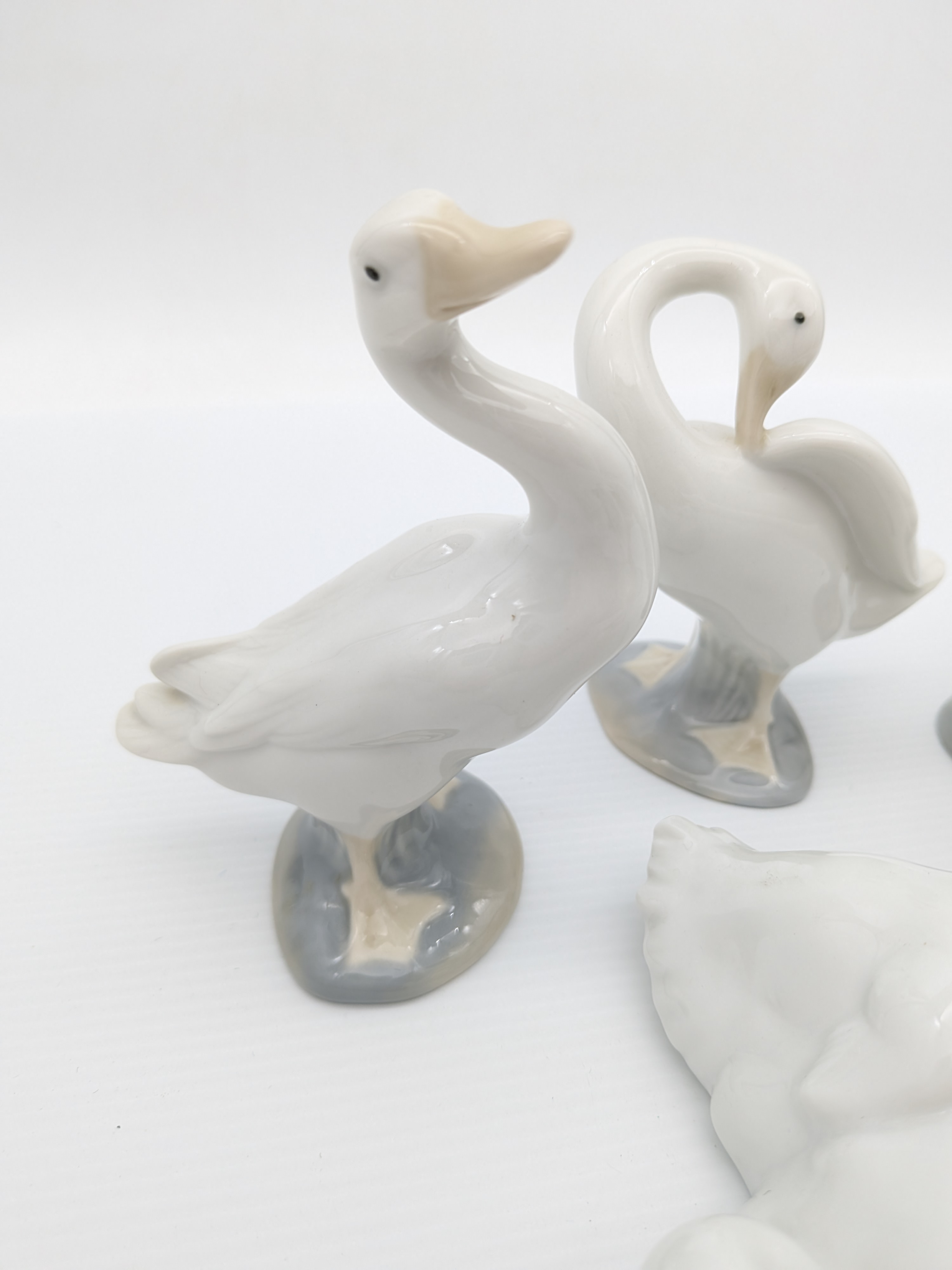 Set of Four Nao by Lladró Porcelain Geese Figurines, 1990's — Lot 066, photograph 2