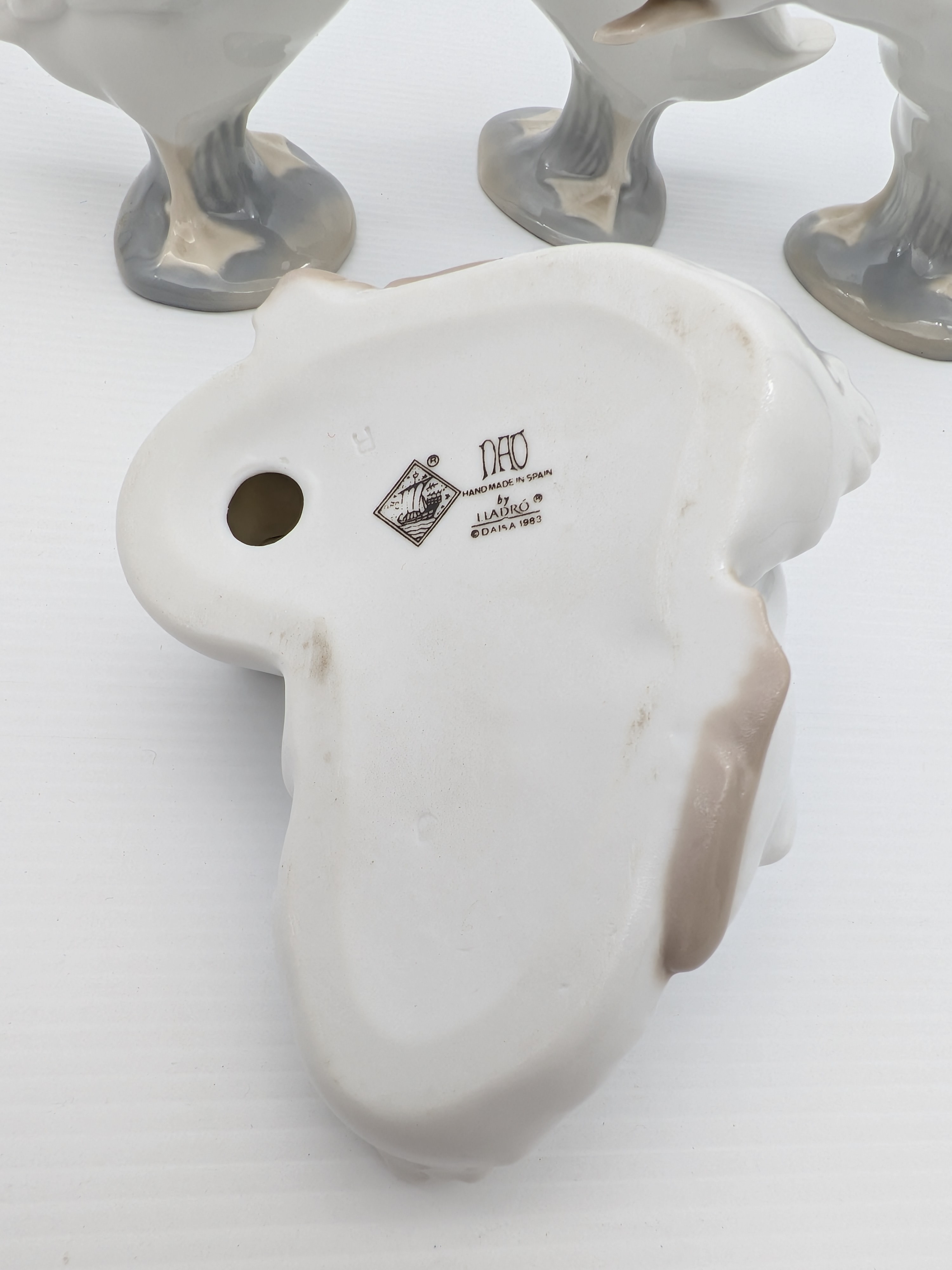 Set of Four Nao by Lladró Porcelain Geese Figurines, 1990's — Lot 066, photograph 5