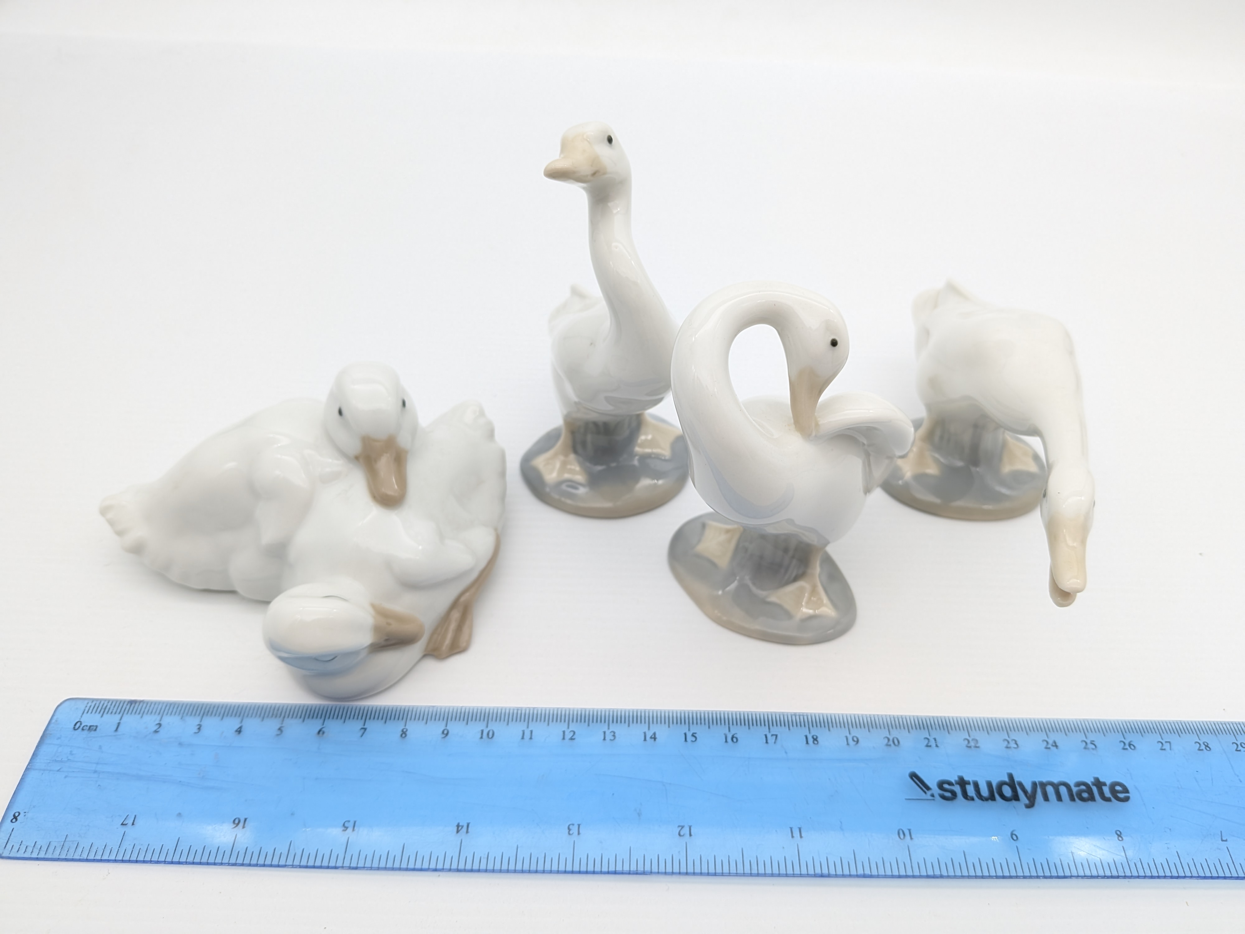 Set of Four Nao by Lladró Porcelain Geese Figurines, 1990's — Lot 066, photograph 7