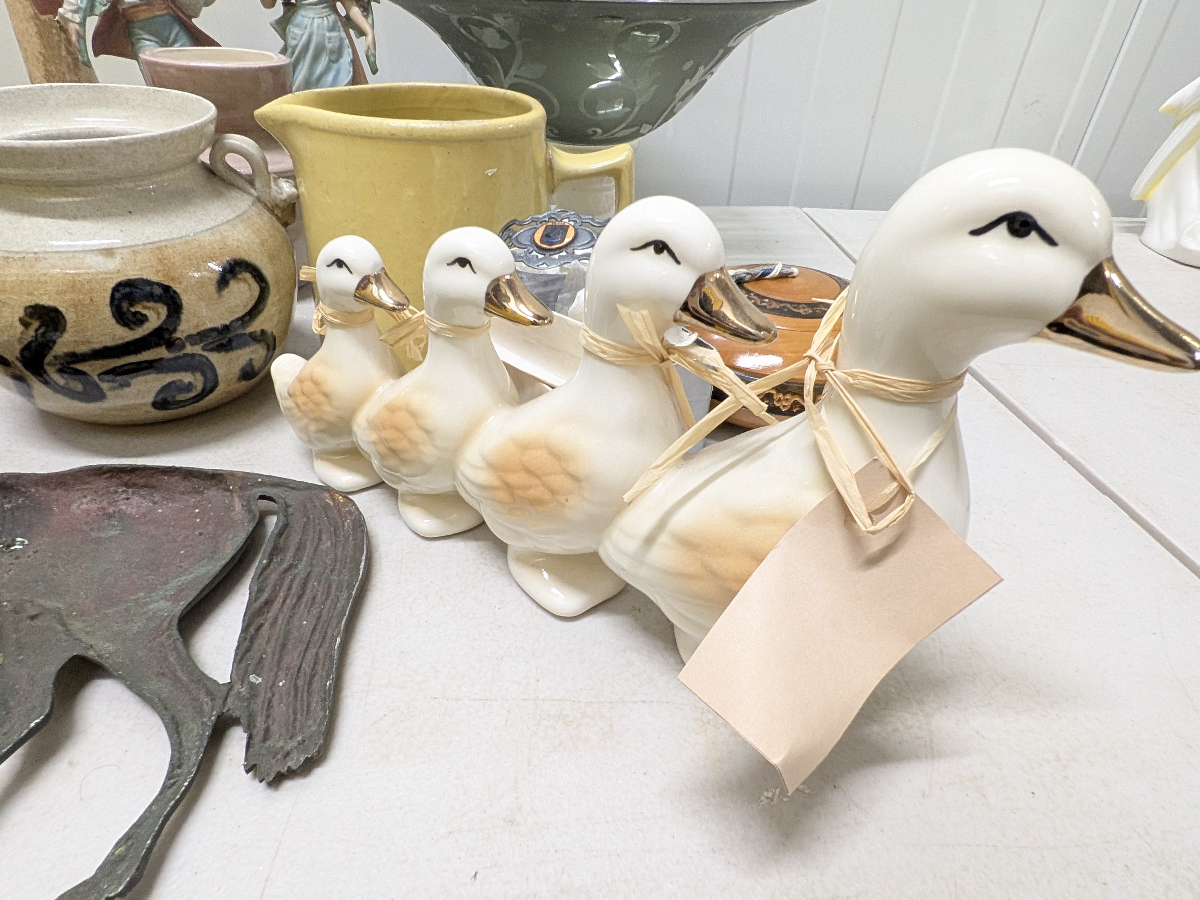 Lot of Decorative Sundries including Ceramic Figurines, Glass Bowl, Pottery, and Metalware — Lot 033, photograph 2