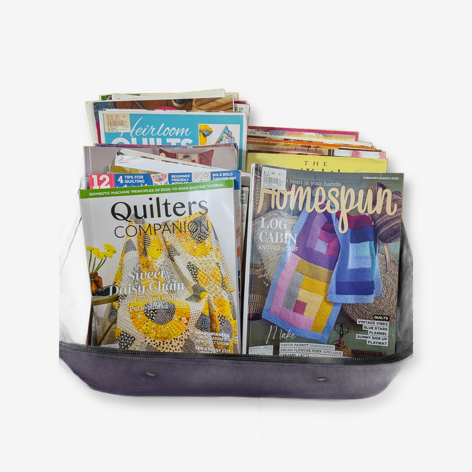 Collection of Quilting & Craft Magazines in a Purple Suitcase — Lot 035
