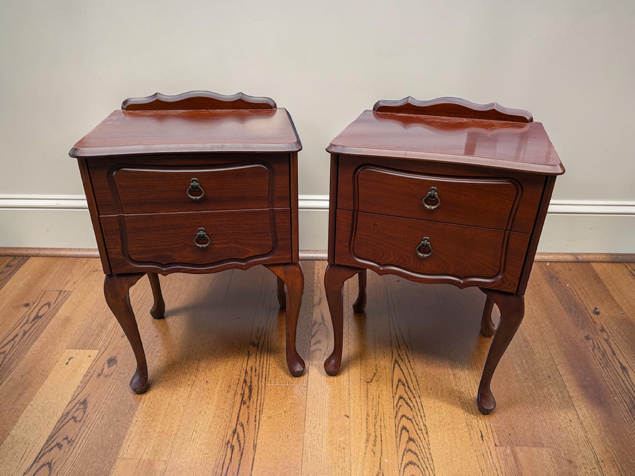 Pair of French Provincial Style Two-Drawer Bedside Tables, mid-20th Century — Lot 006