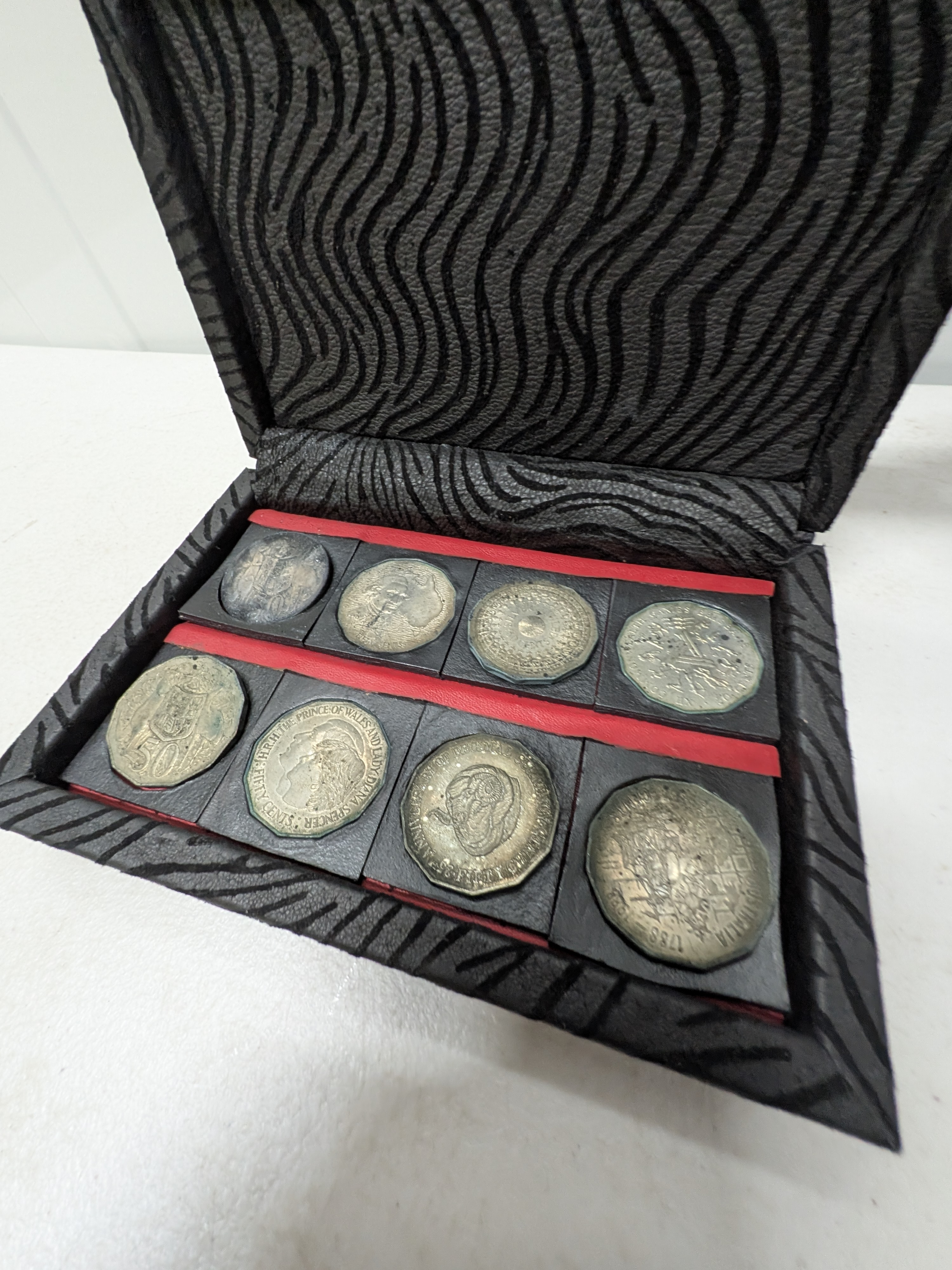 Collection of Australian 50 Cent Coins in Display Box, Incl. Round 50c — Lot 067