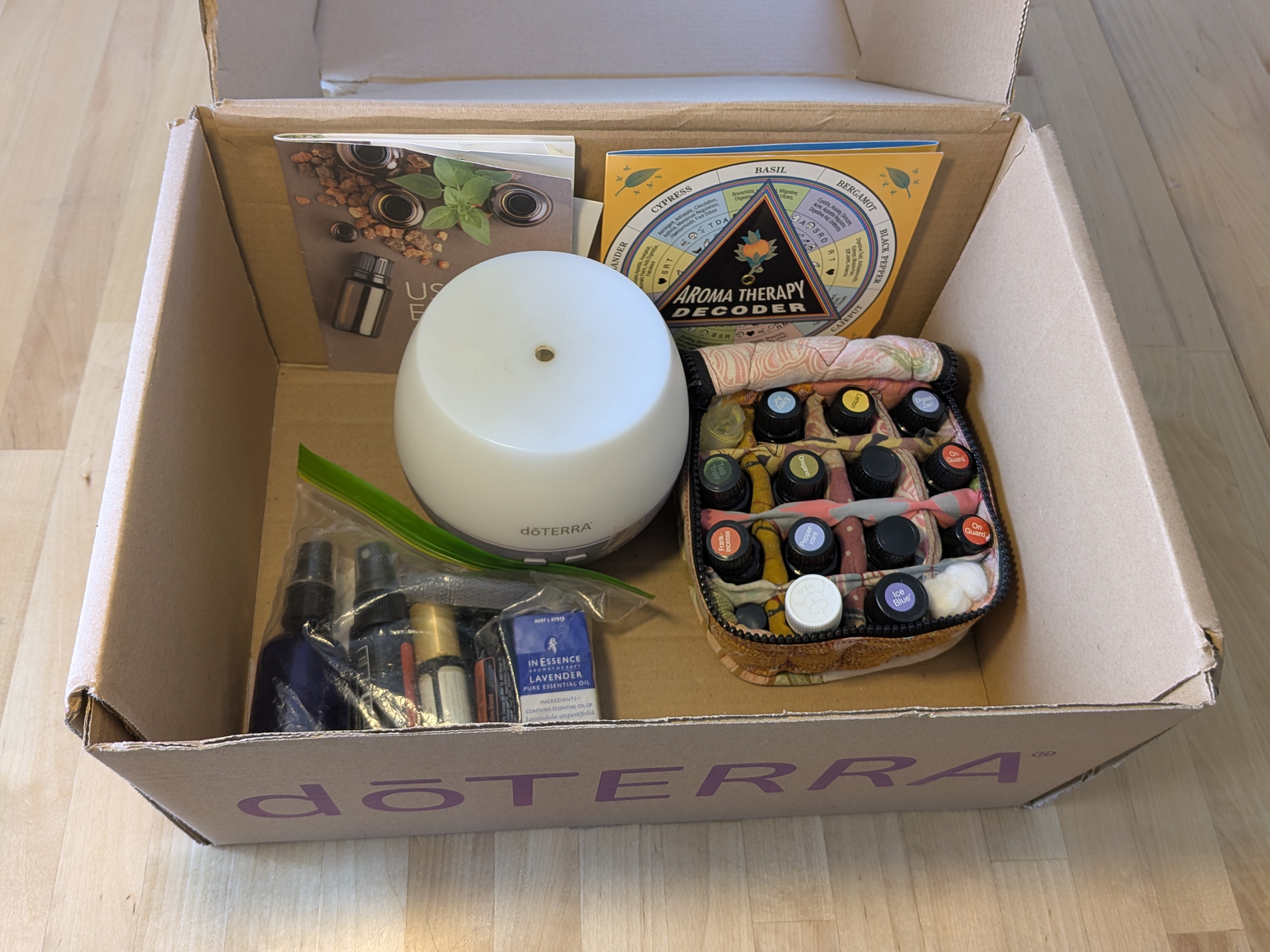 Lot of doTERRA Essential Oils and Diffuser with Sundries — Lot 082, photograph 4
