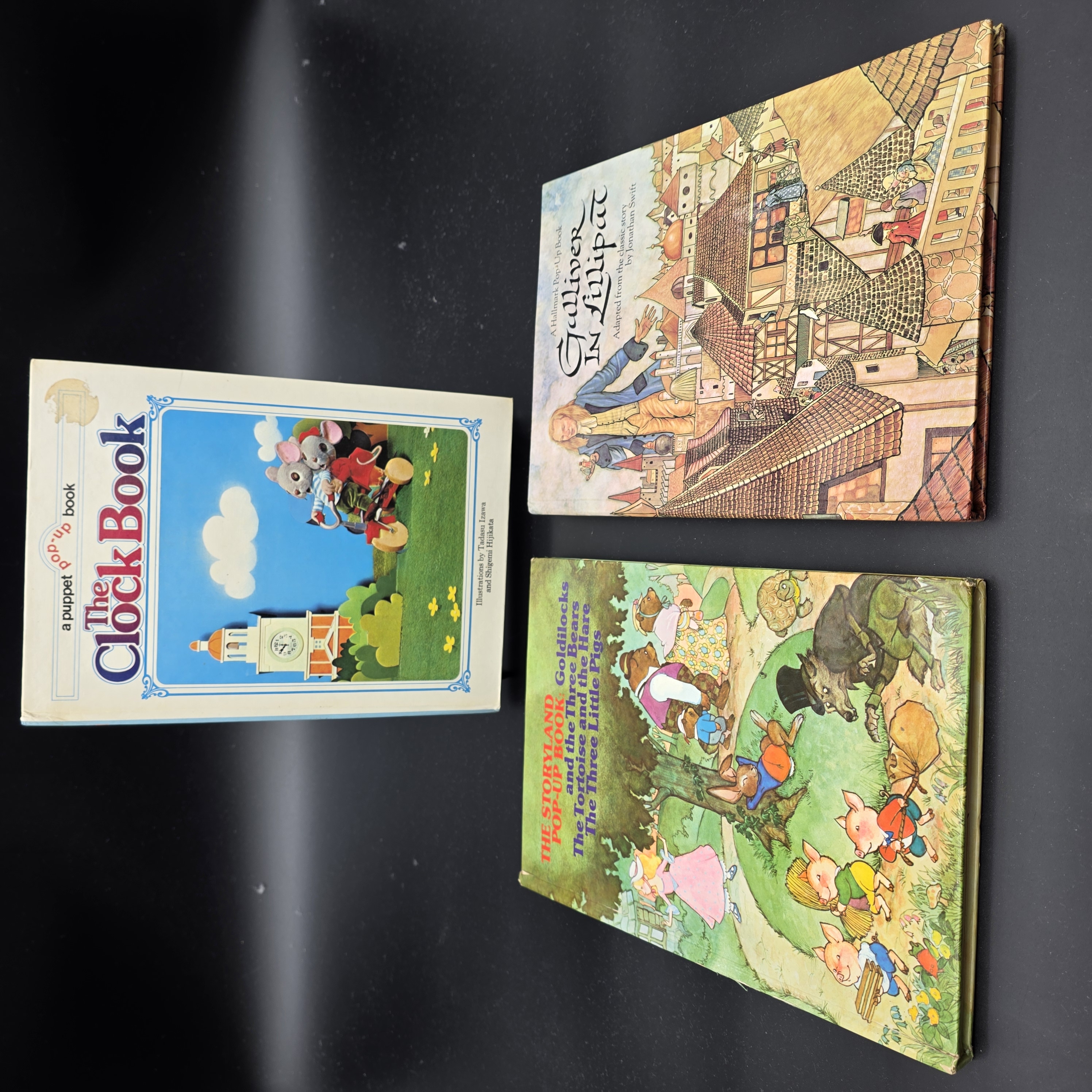 Vintage Pop-Up Children's Books Collection - The Clock Book, Storyland, Gulliver in Lilliput — Lot 102, photograph 1
