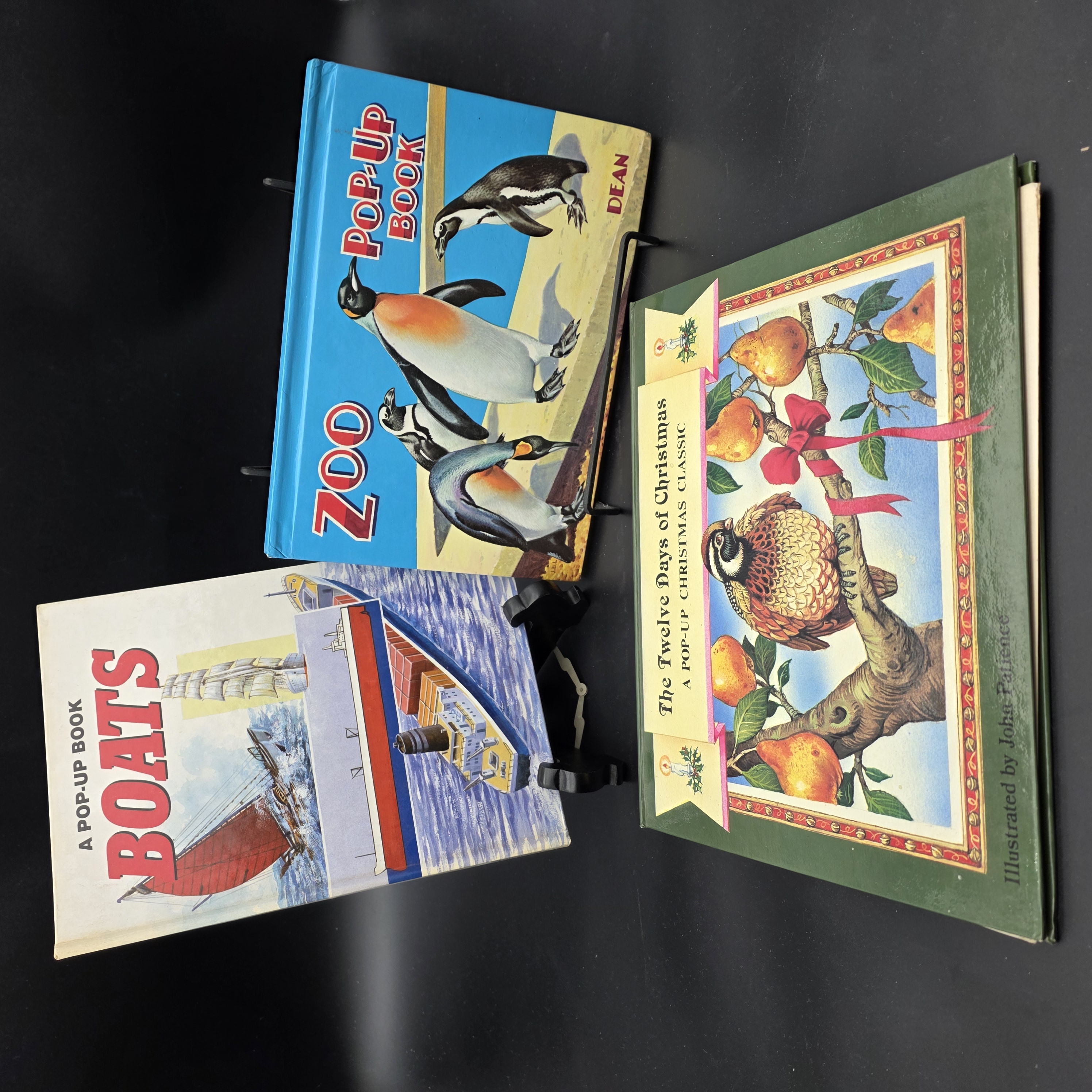Lot of Three Vintage Pop-Up Books: The Twelve Days of Christmas, Zoo, and Boats — Lot 065, photograph 1
