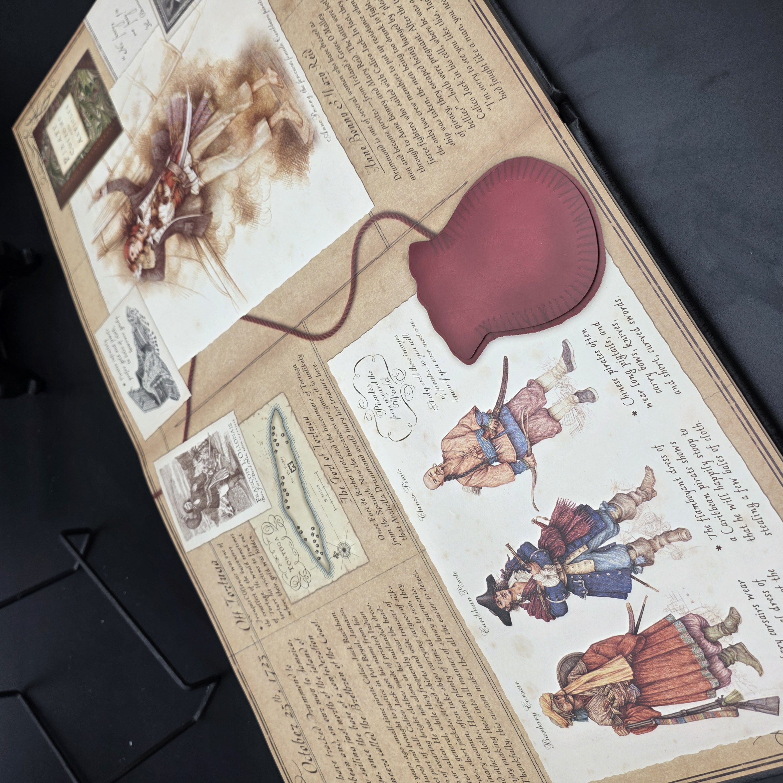 A lot comprising two highly engaging interactive children's books, "Pirateology" and "Pirates", designed to immerse young readers in the world of pirates with lavish illustrations and exciting details. - View 3