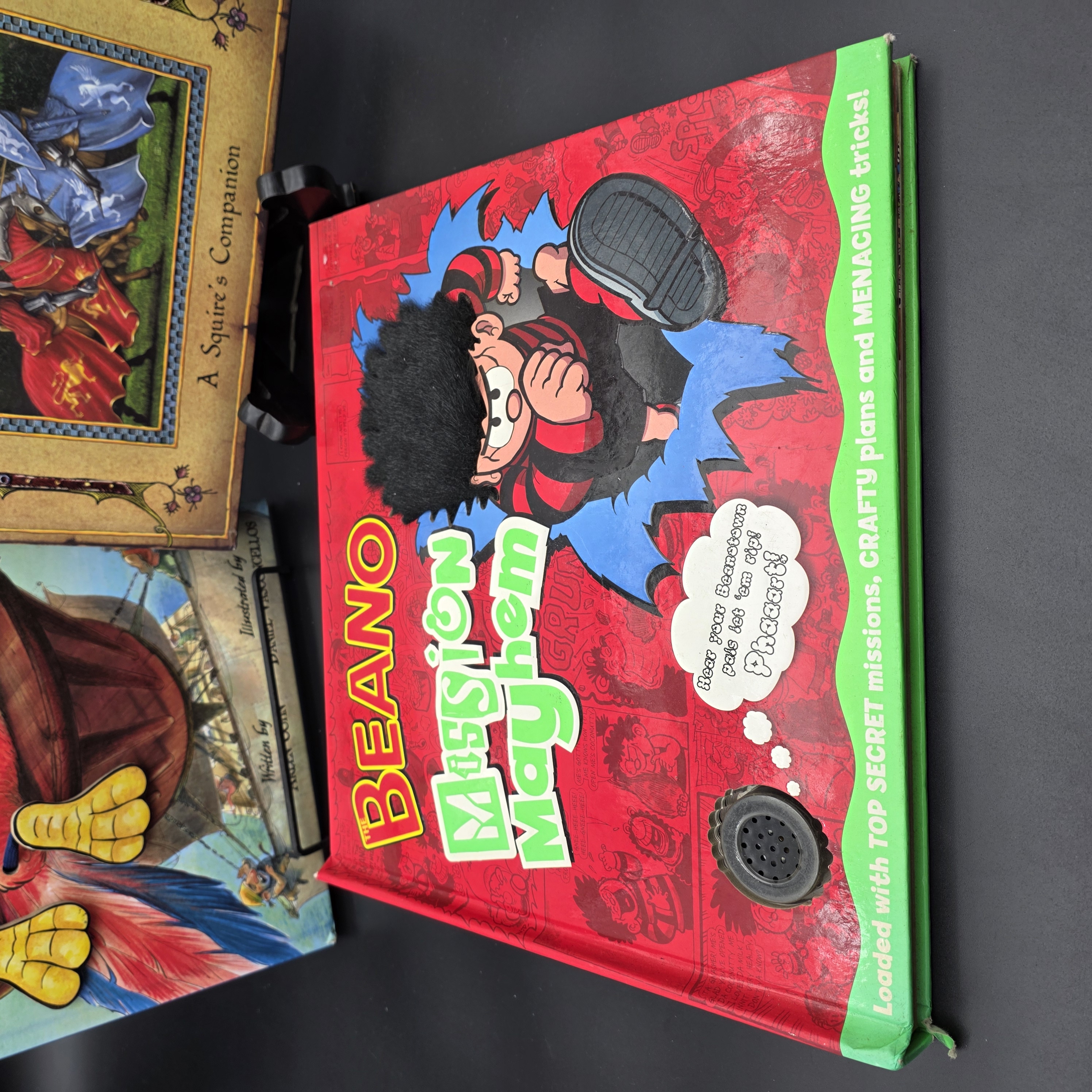 Lot of Three Children's Interactive & Pop-Up Books: Beano, Parrot, Knight — Lot 098, photograph 2