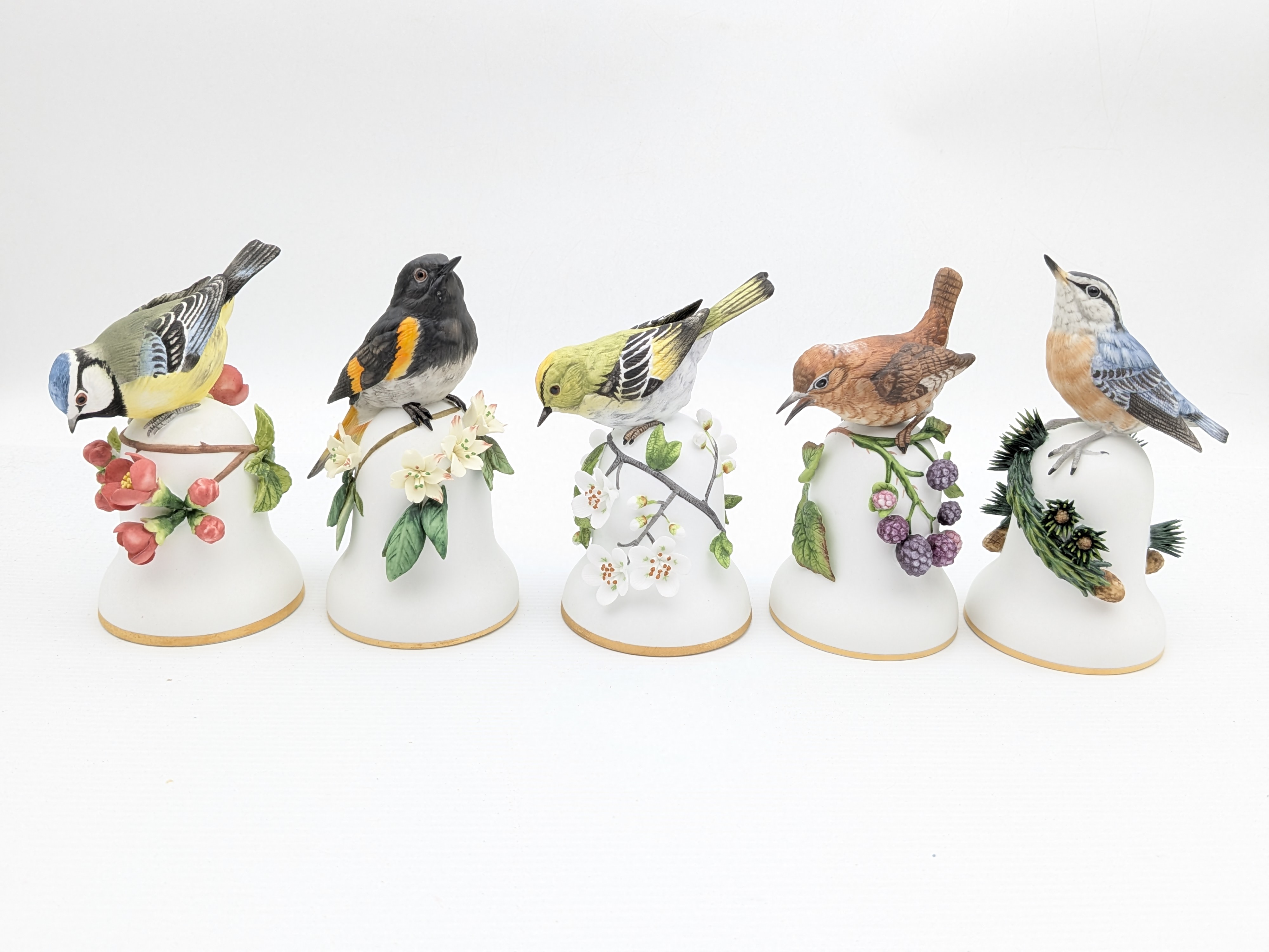 Set of Five Franklin Porcelain 'Songbirds of the World' Bells by Peter Barrett, 1980's — Lot 057