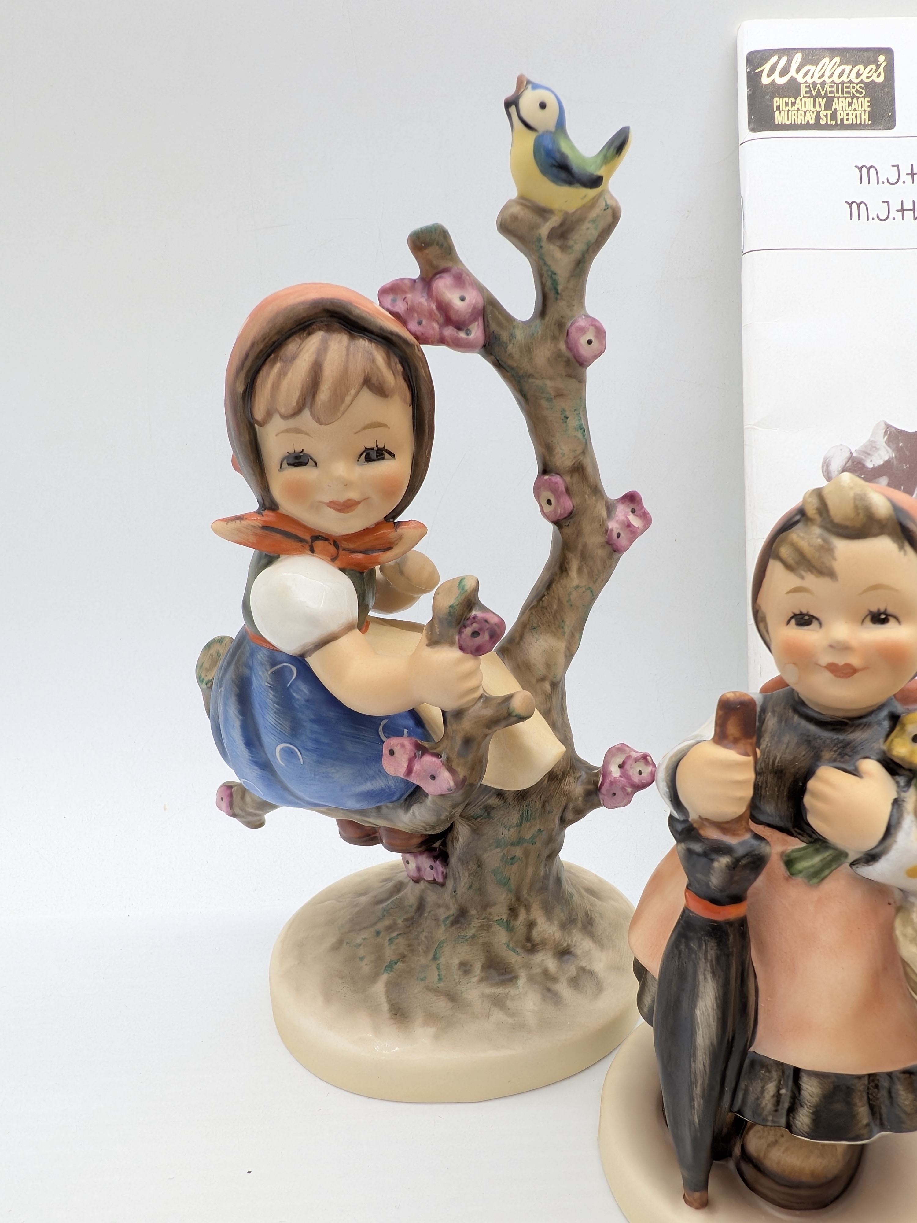 Collection of Five Goebel M.J. Hummel Porcelain Figurines with Catalogue — Lot 048, photograph 2