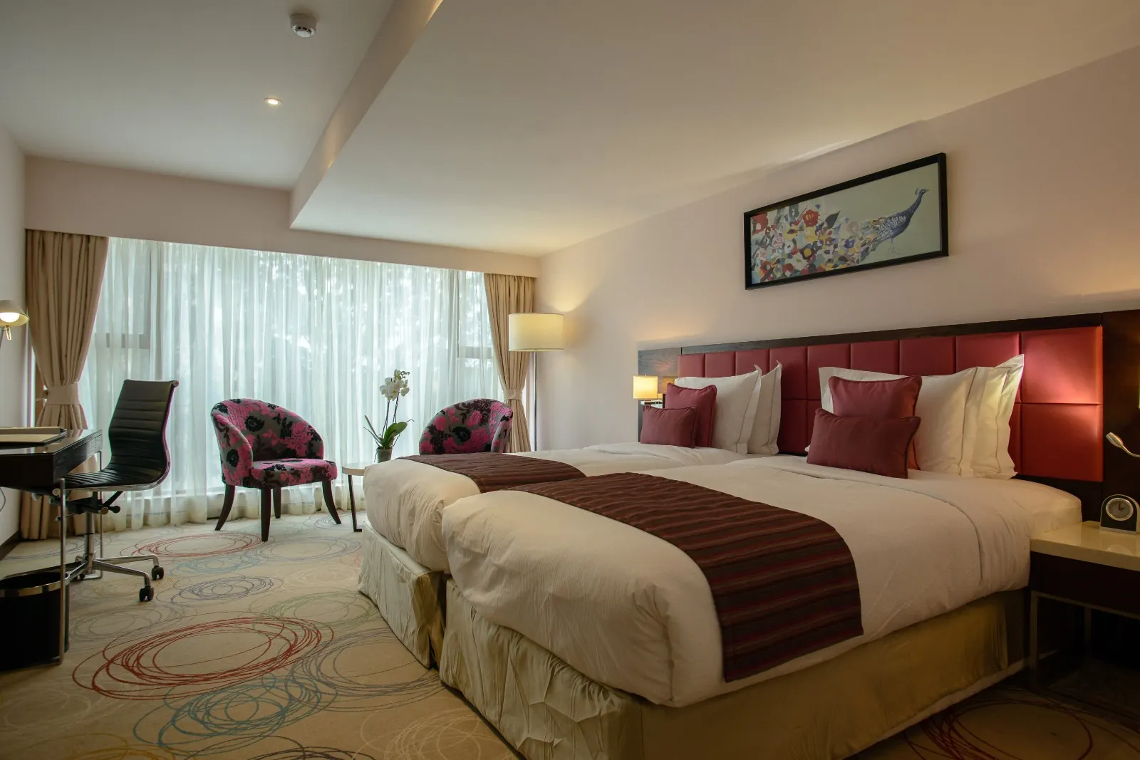 Twin guest room at The Concord Hotel & Suites