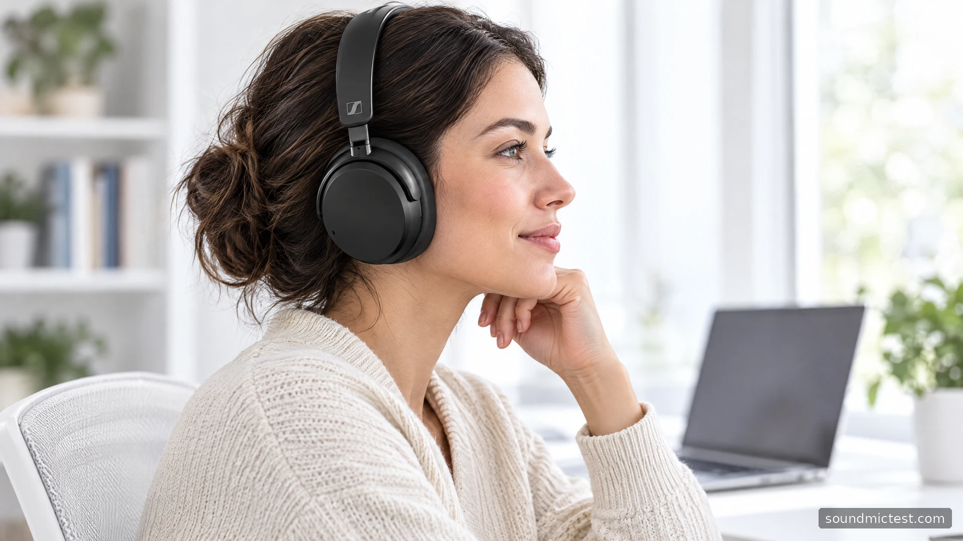 Black Sennheiser Accentum Wireless worn at a bright white office desk
