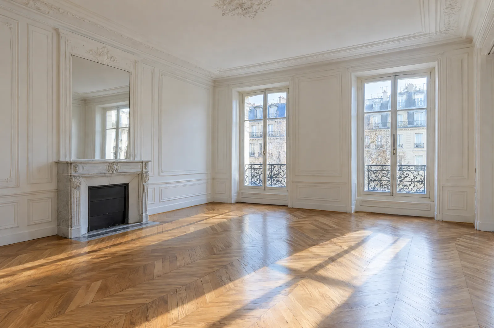 The empty living room of a Paris apartment with herringbone oak floors, a marble fireplace and two French windows (AI-generated illustration)