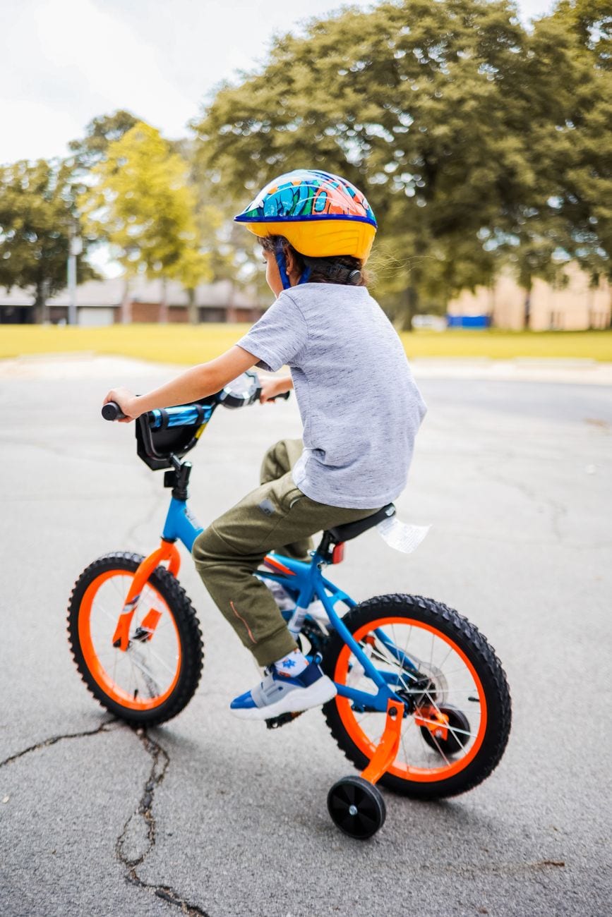 A person rides a bicycle as a healthy outdoor activity.