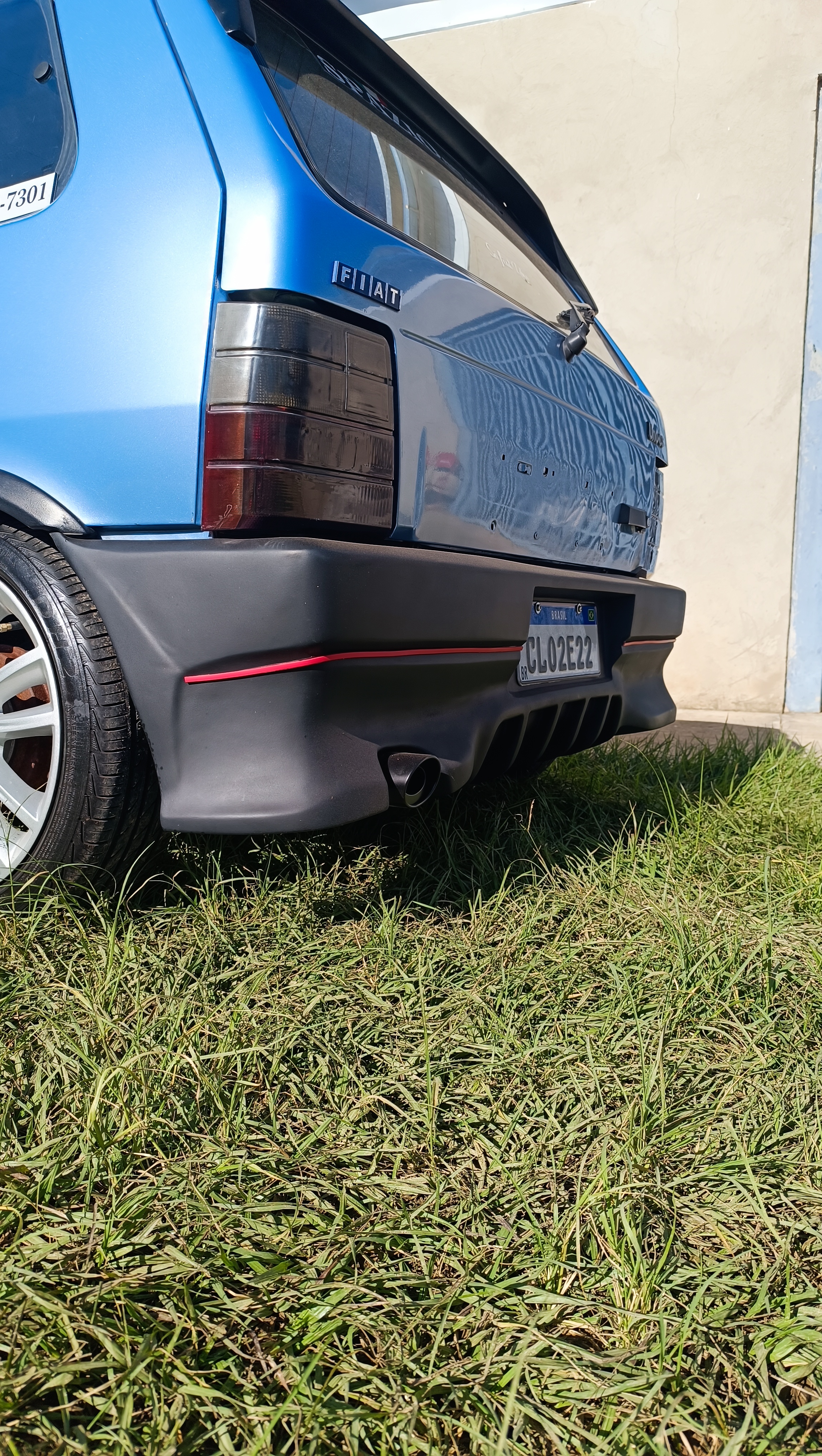 PARA-CHOQUE TRASEIRO FIAT UNO - Miniatura 4