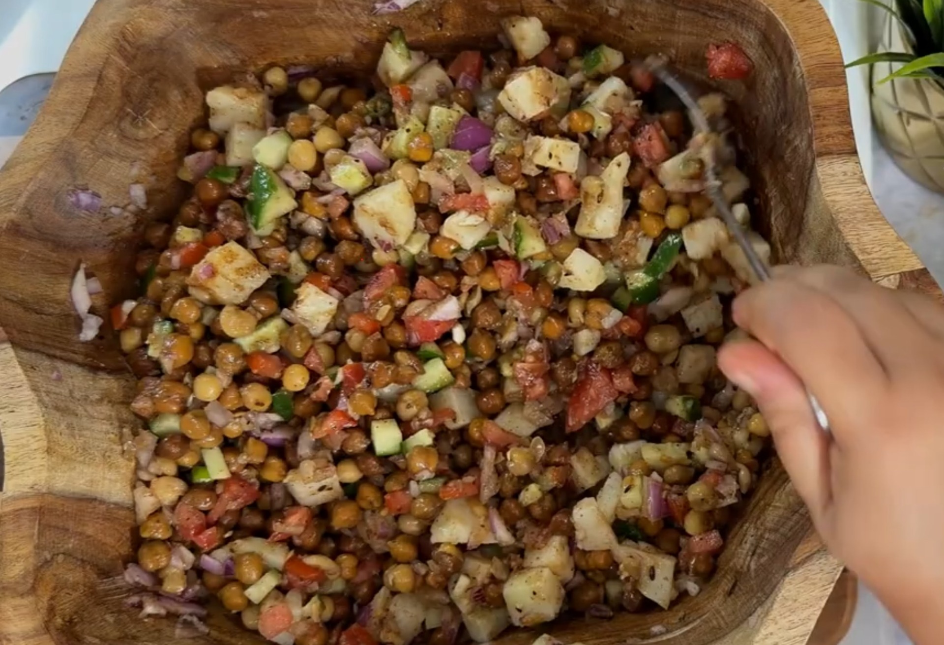 High-protein chana matar chaat served in a bowl with fresh garnishes