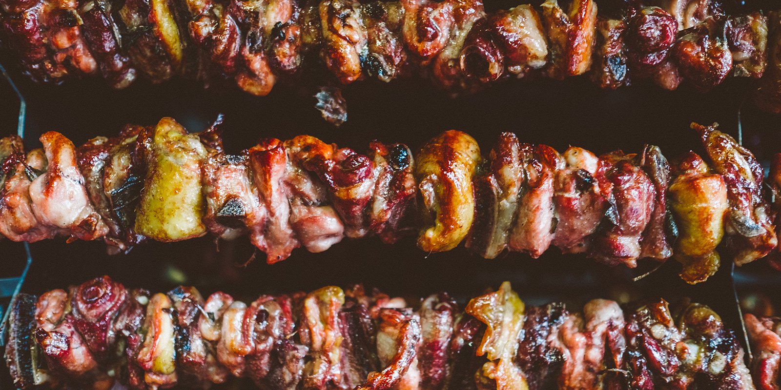 Close up of spiedo meat roasting