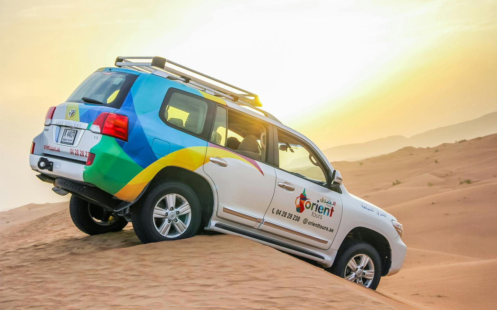 Abu Dhabi Sunrise Desert Safari with 4x4 Dune Bashing & Sandboarding Image 7