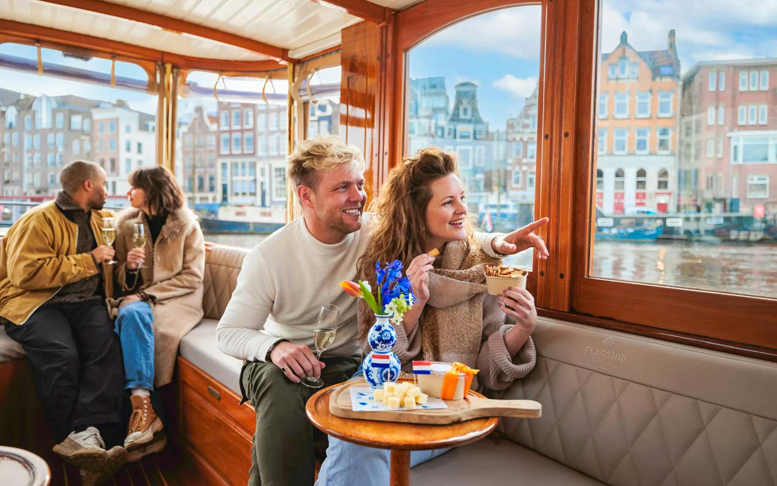 Amsterdam: 1-Hour Luxury Romantic Saloon Boat Cruise with Bubbles & Bites Image 1