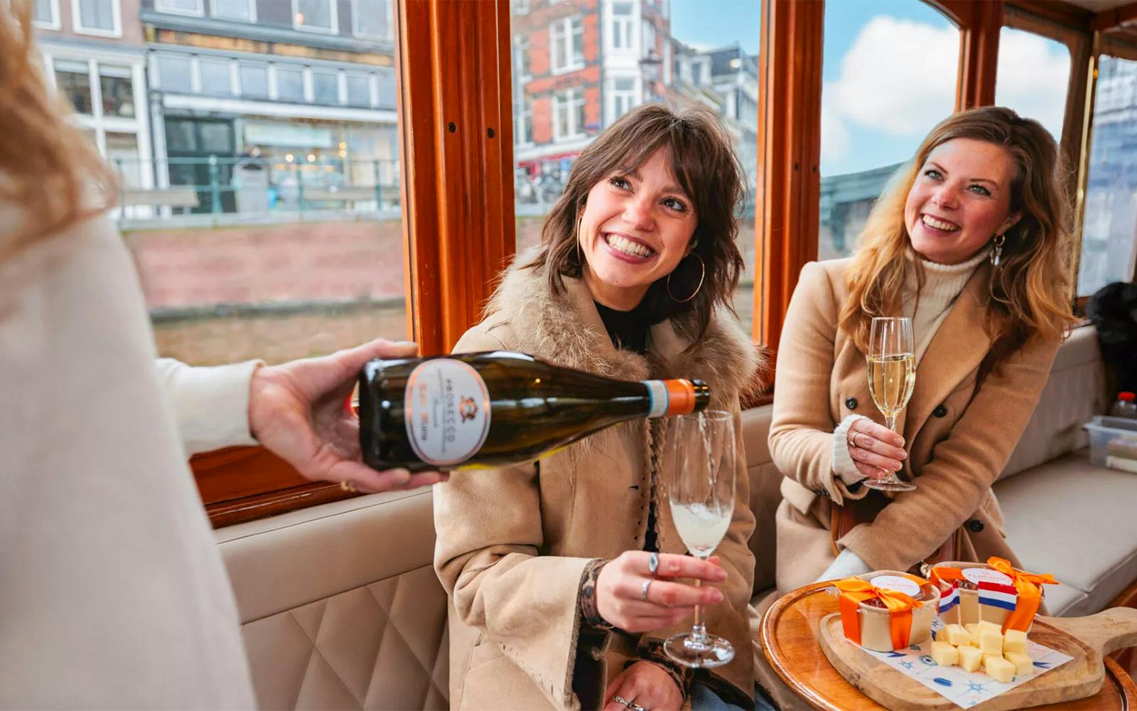 Amsterdam: 1-Hour Luxury Romantic Saloon Boat Cruise with Bubbles & Bites Image 2