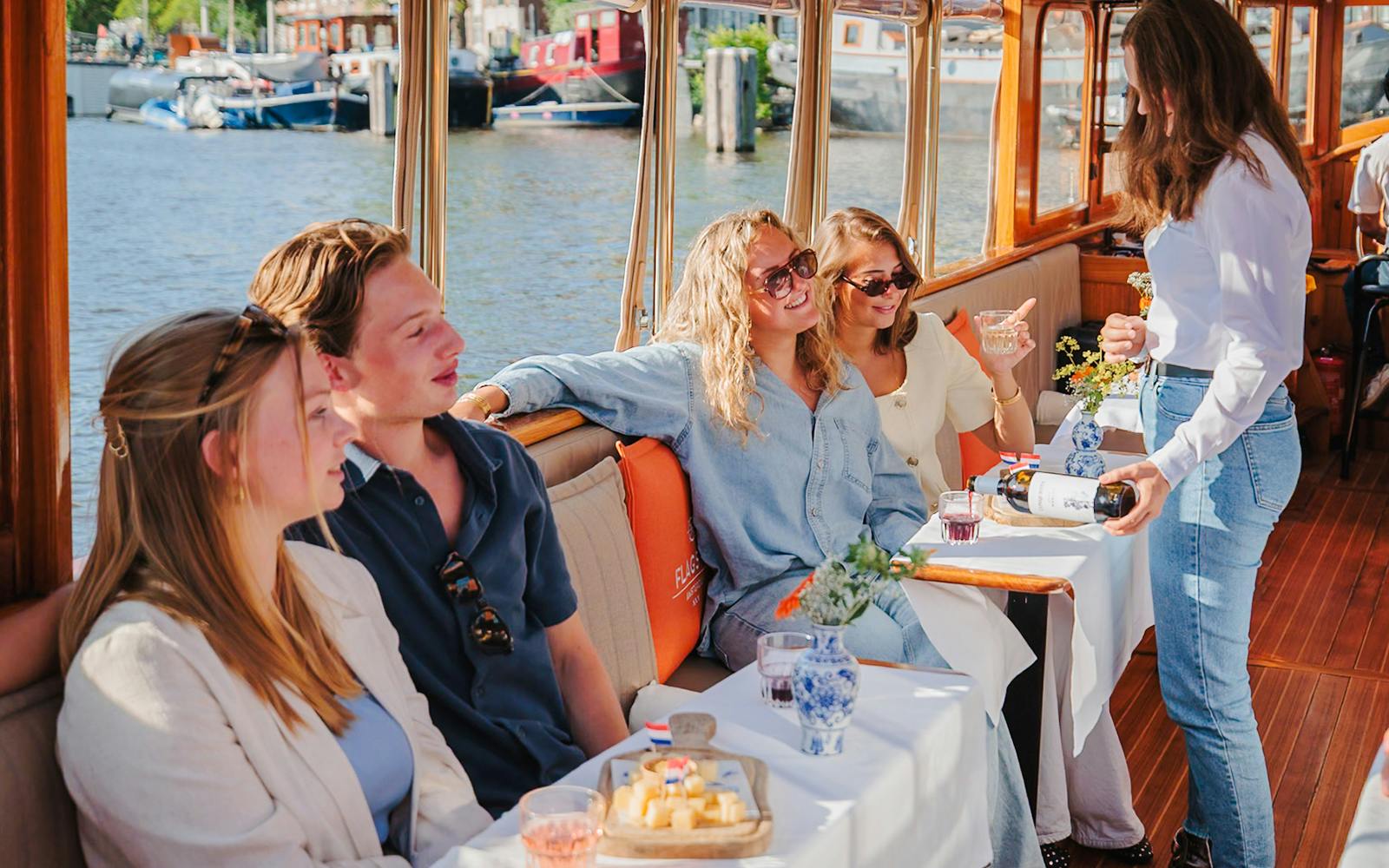 Amsterdam: 1-Hour Luxury Saloon Boat Cruise with Unlimited Drinks & Cheese Image 3