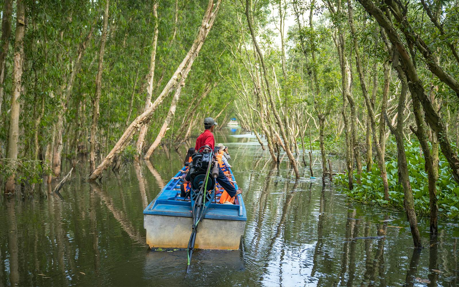 Cu Chi Tunnels & Mekong Delta with Coconut Village Full Day Tour Image 5