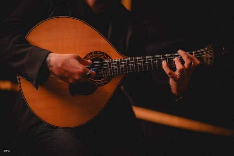 Madeira Fado experience with a glass of wine