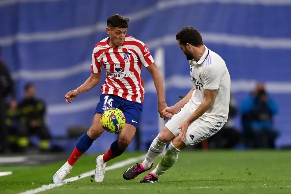 Madrid's teen striker Rodriguez rescues derby draw against Atletico