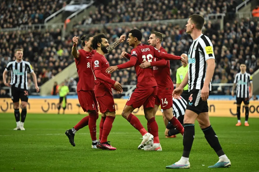Liverpool beats 10-man Newcastle to boost top-4 hopes in EPL