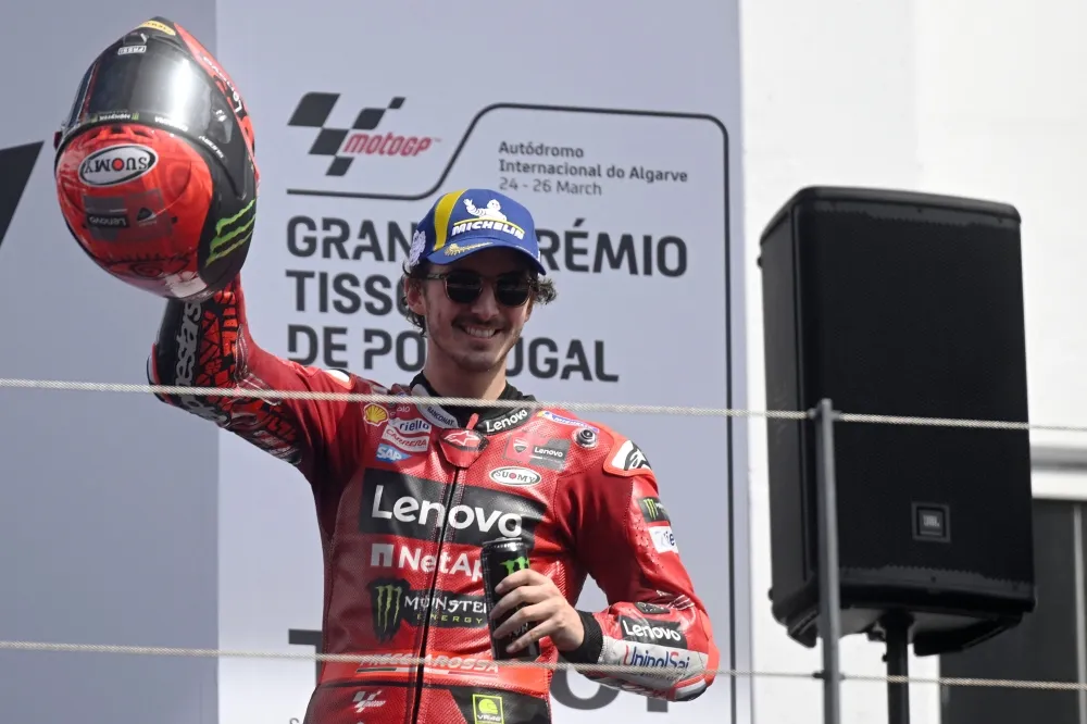 Bagnaia avoids Marquez mayhem to win MotoGP opener in Portugal