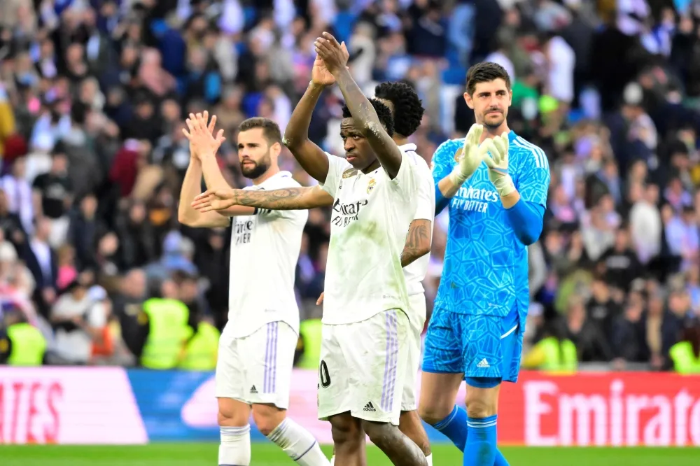 Madrid cut Liga gap on Barca with Espanyol comeback