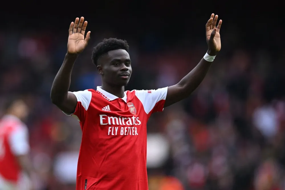 Saka stars as rampant Arsenal move eight points clear