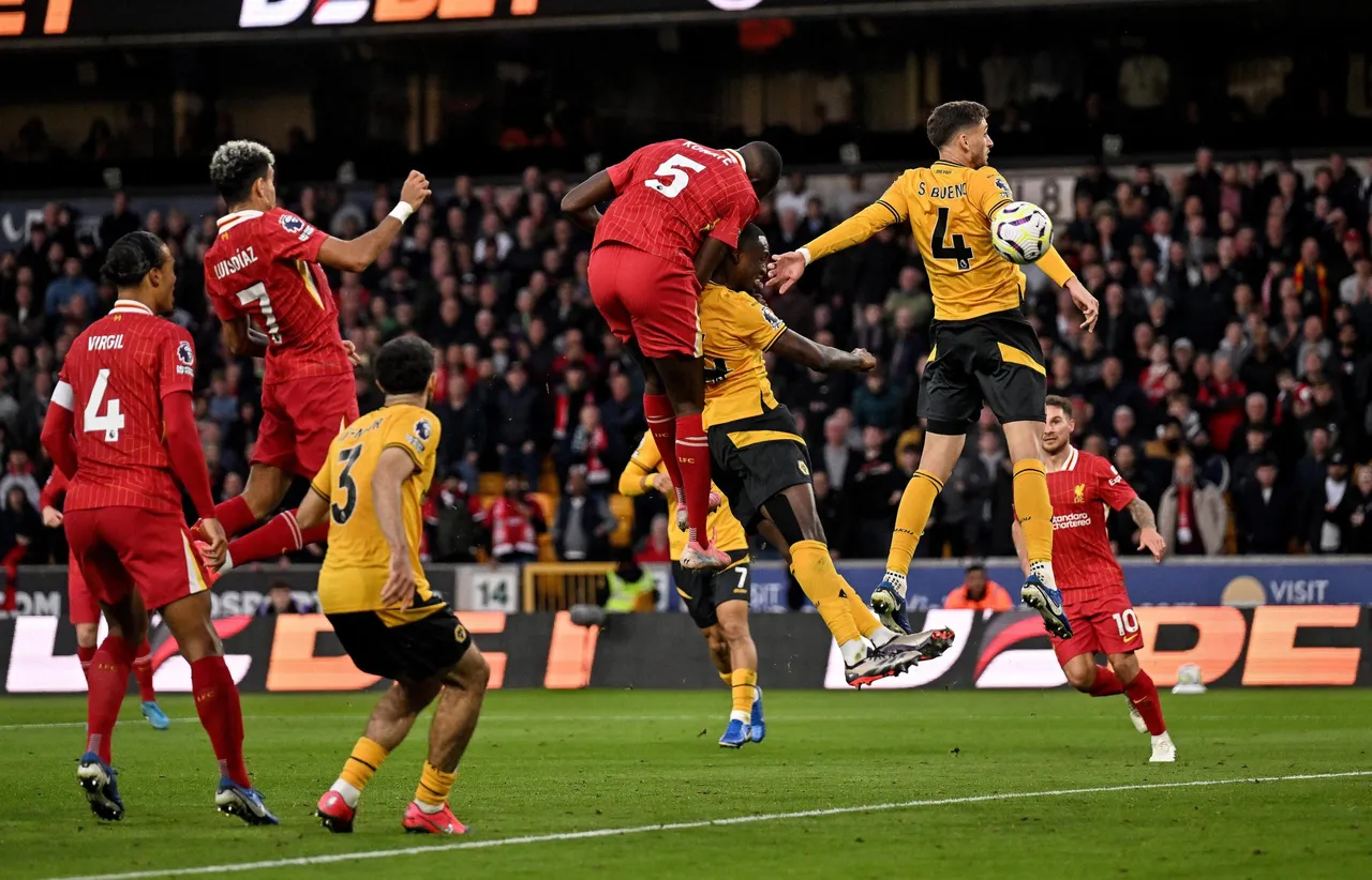 Liverpool reclaim top spot as Salah penalty beats Wolves
