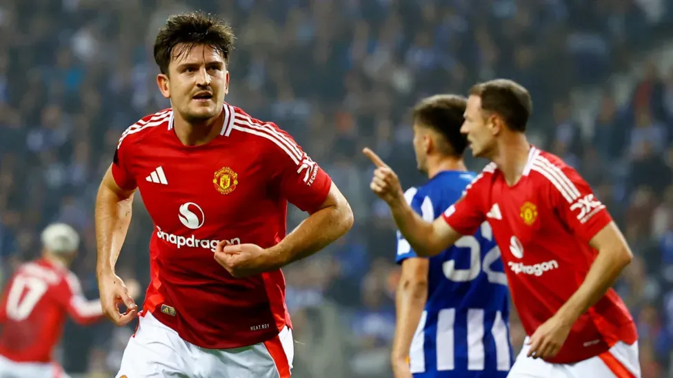 Late Maguire header gives 10-man Man Utd draw in six-goal thriller at Porto