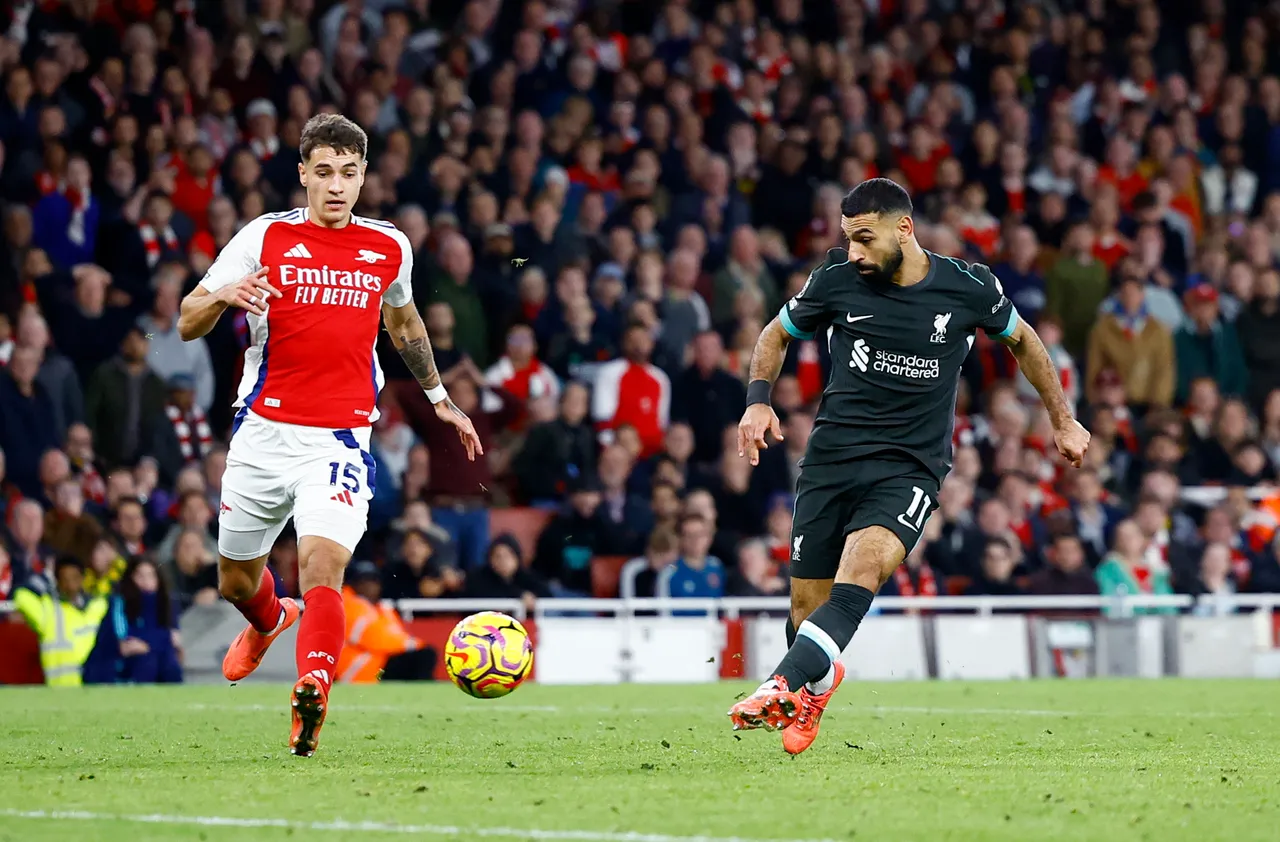 Salah strike hands Liverpool Premier League draw at Arsenal