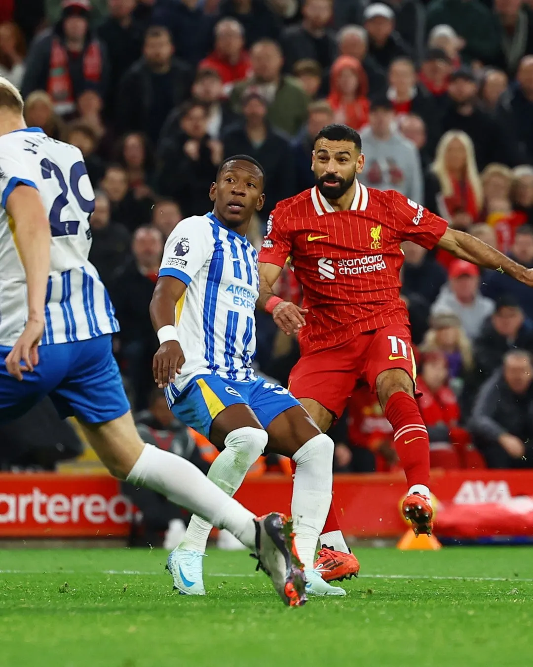 Salah stunner sends Liverpool top of table