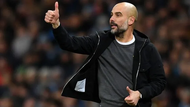 Pep Guardiola signs Manchester City extension through 2027