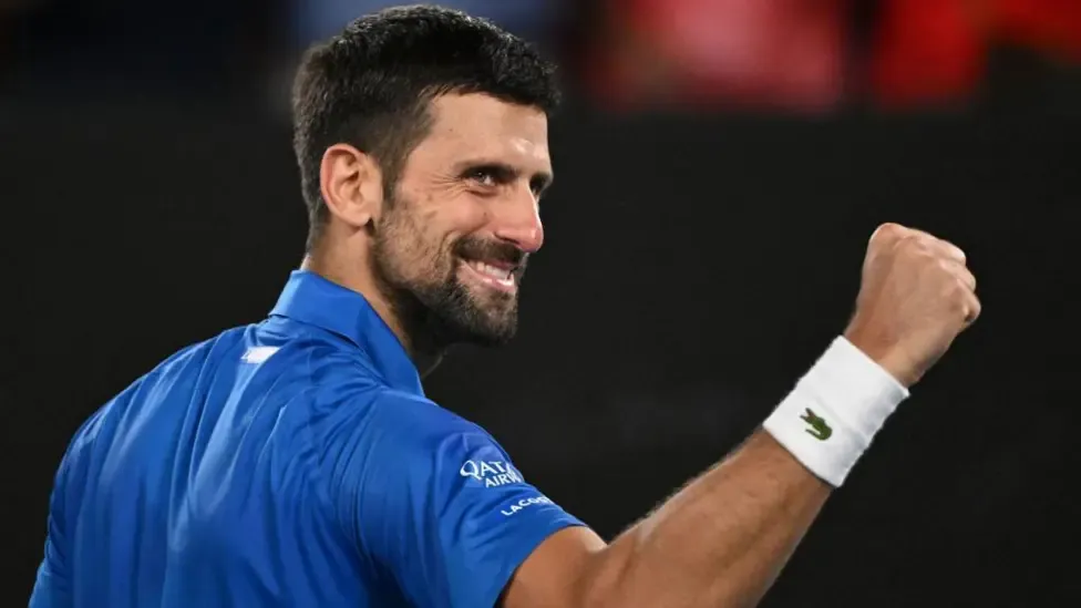 Djokovic breaks Federer record in Melbourne win