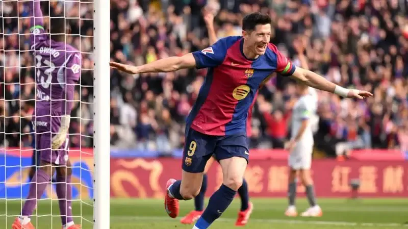 Barca beat Alaves to move four points behind leaders Real