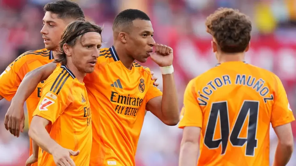 Late Mbappe, Bellingham goals sink 9-man Sevilla in Ancelotti's final away game