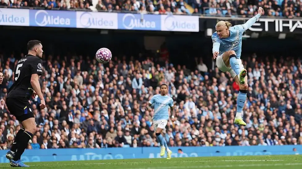 Haaland double fires Manchester City to Premier League's summit