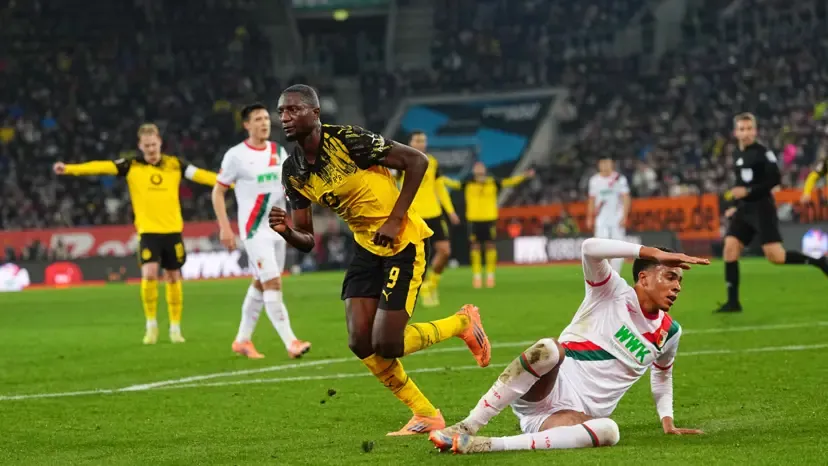 Guirassy strike earns Dortmund narrow win over Augsburg ahead of Man City clash
