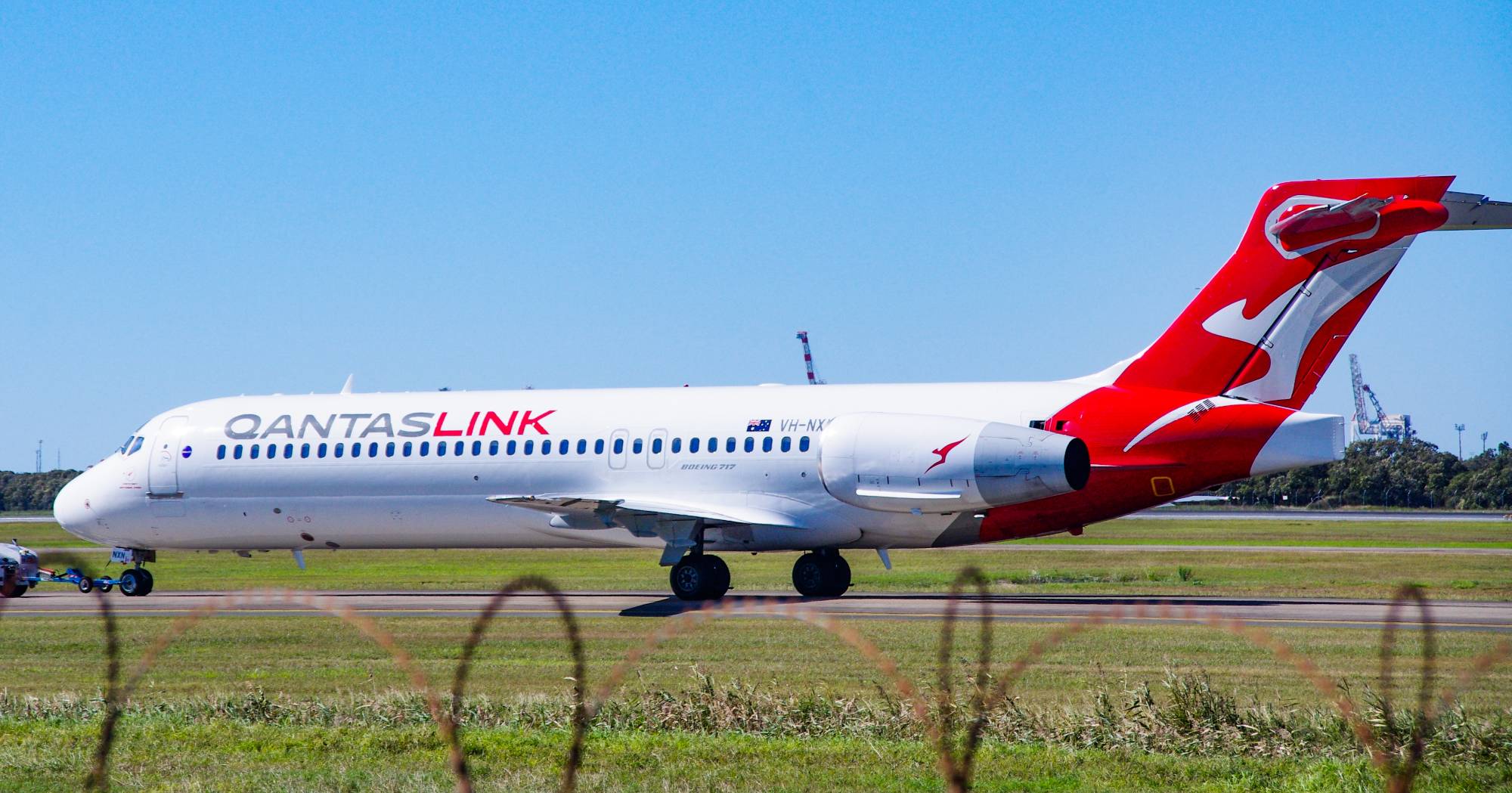 QantasLink (National Jet Systems) VH-NXN at YBBN by SingingAvgeek